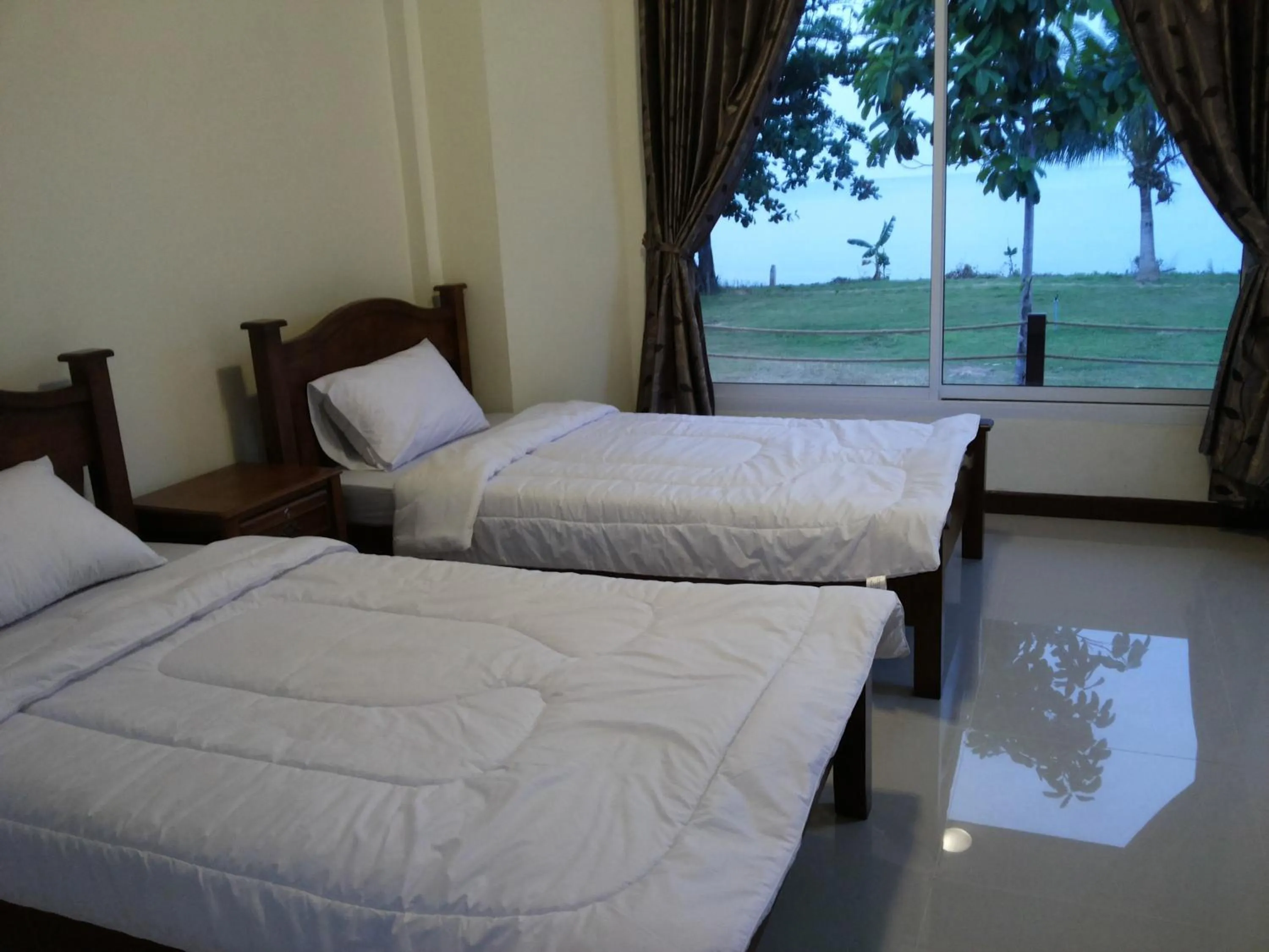 Bed in Lomtalay Resort Trat