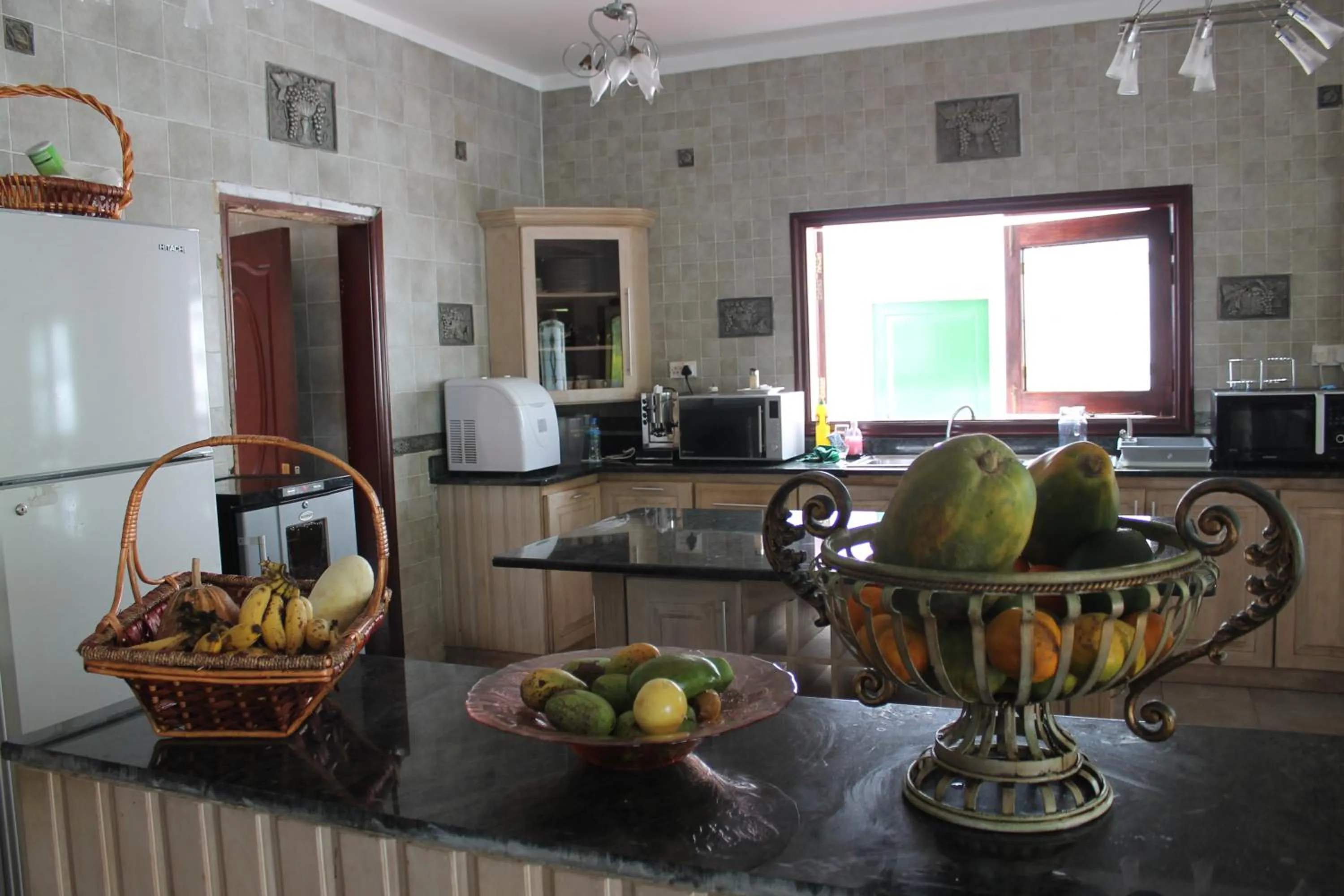 Kitchen or kitchenette in Le Bonheur Villa