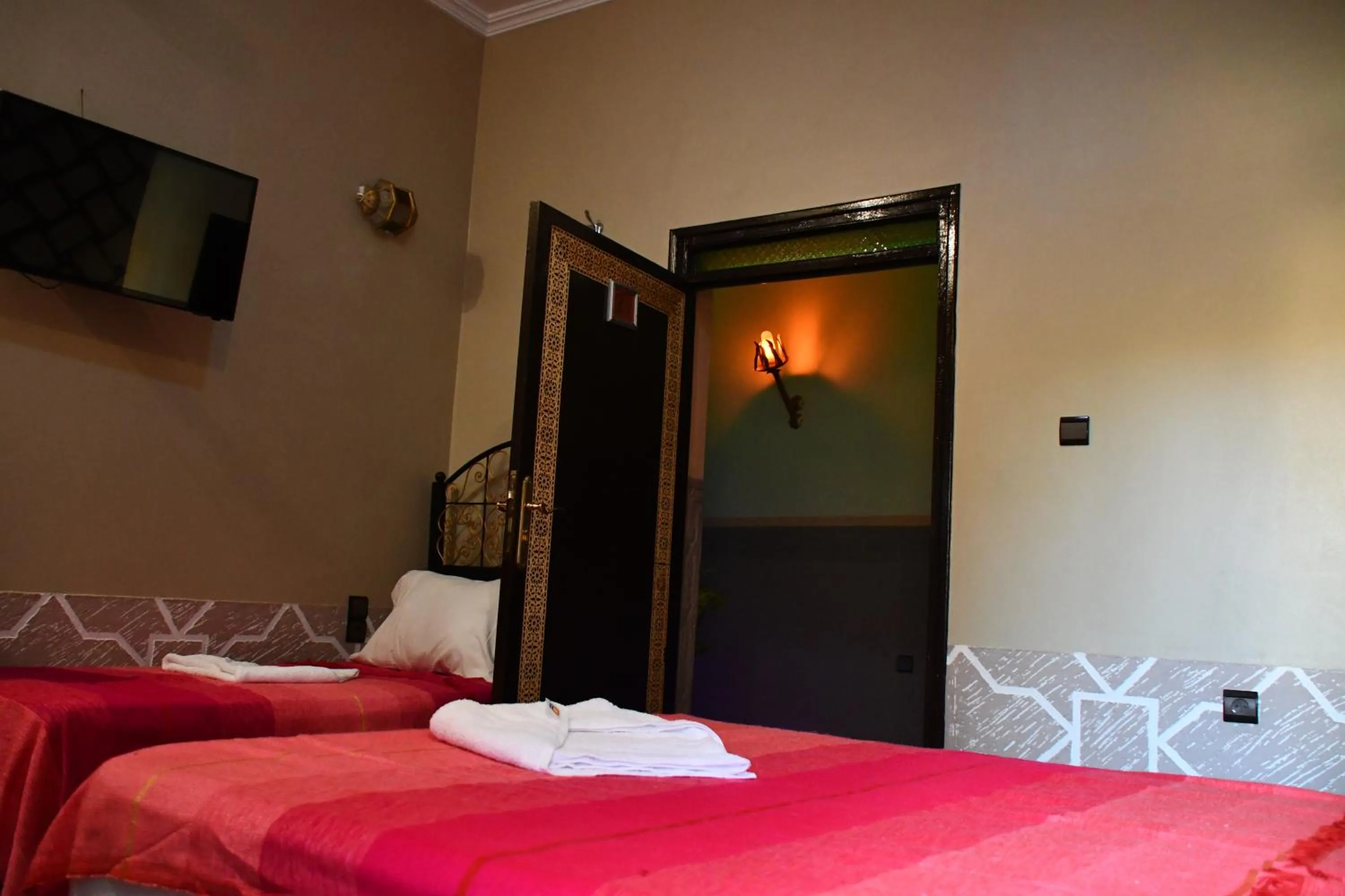 Bed in Hôtel La Vallée Des Oiseaux