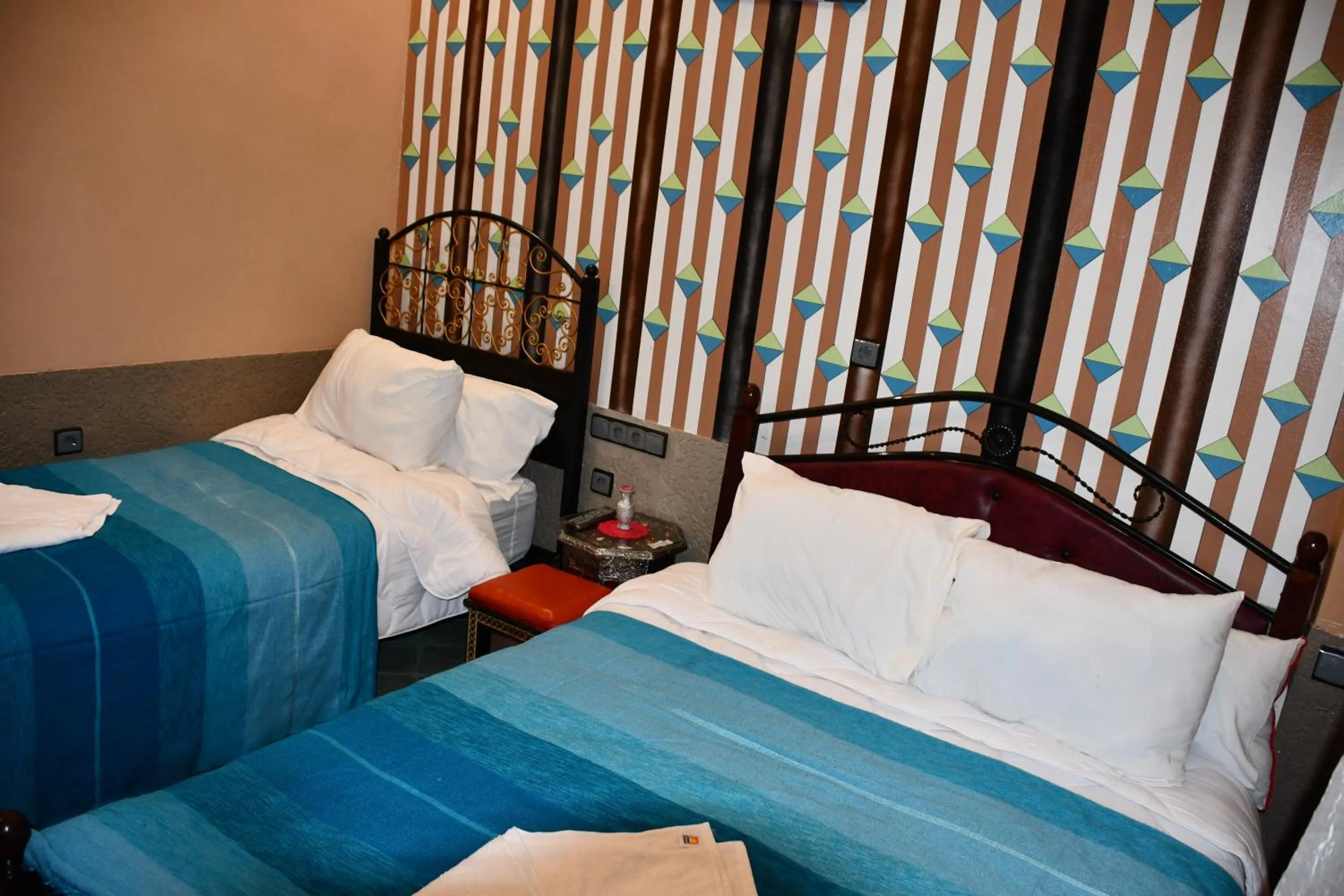 Bed in Hôtel La Vallée Des Oiseaux