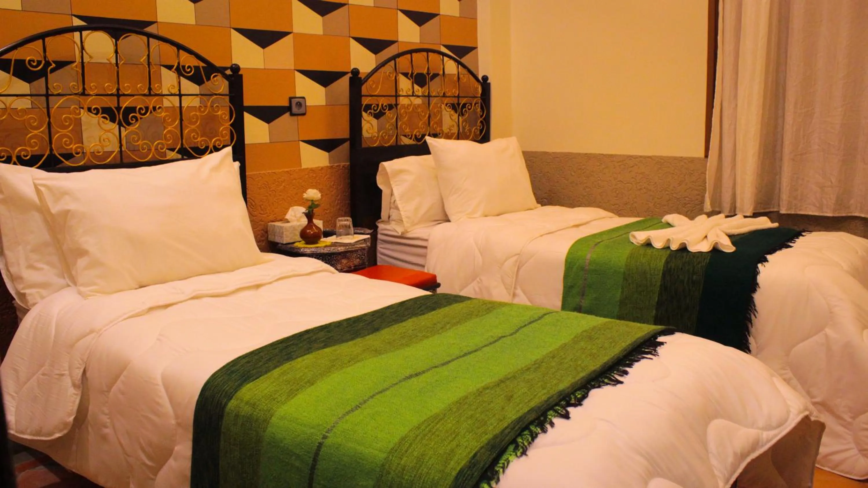 Bed in Hôtel La Vallée Des Oiseaux