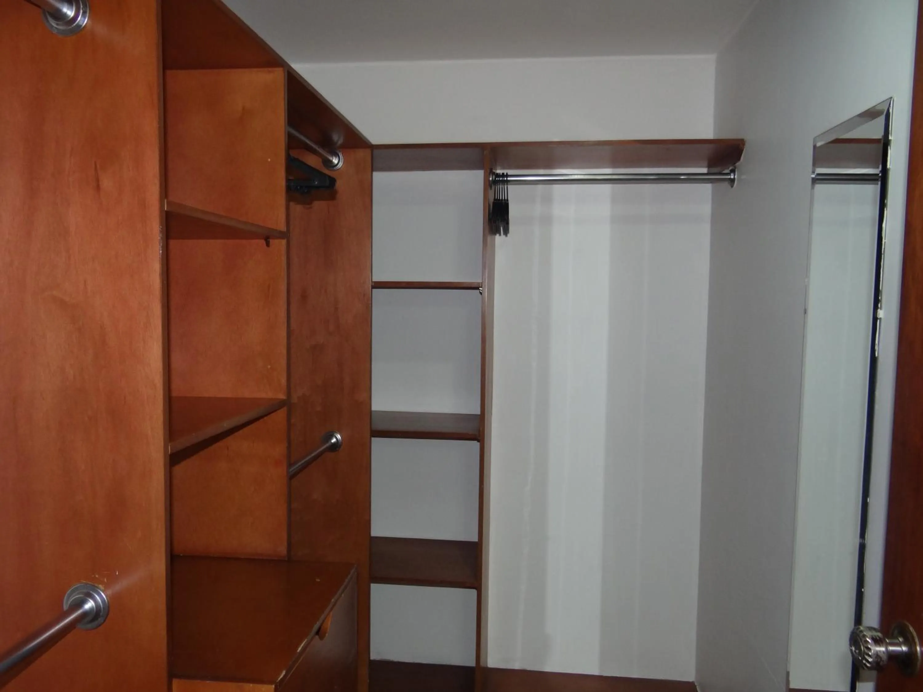 wardrobe in Altura Rooms & Suites