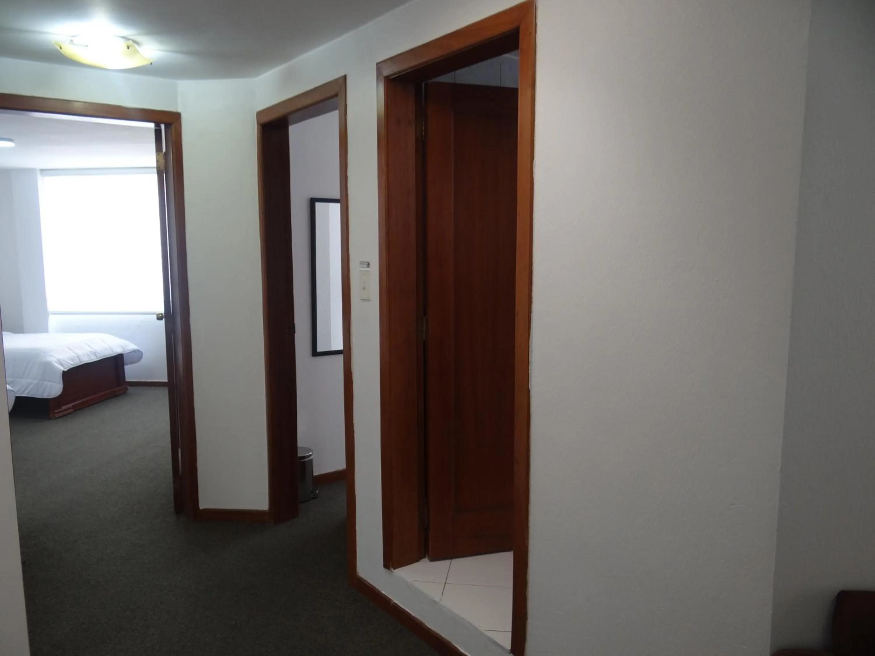 Bed in Altura Rooms & Suites