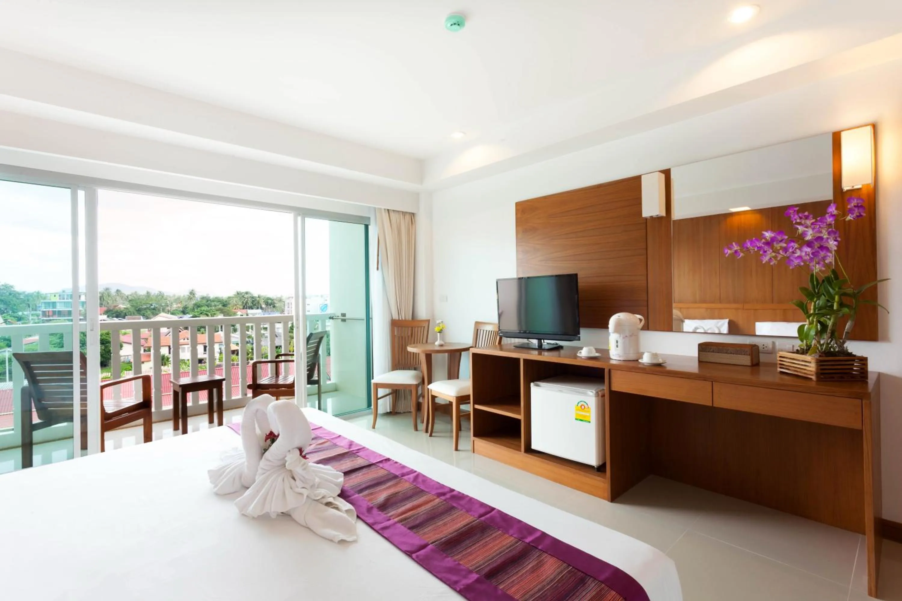 Bed in Rawai Princess Hotel