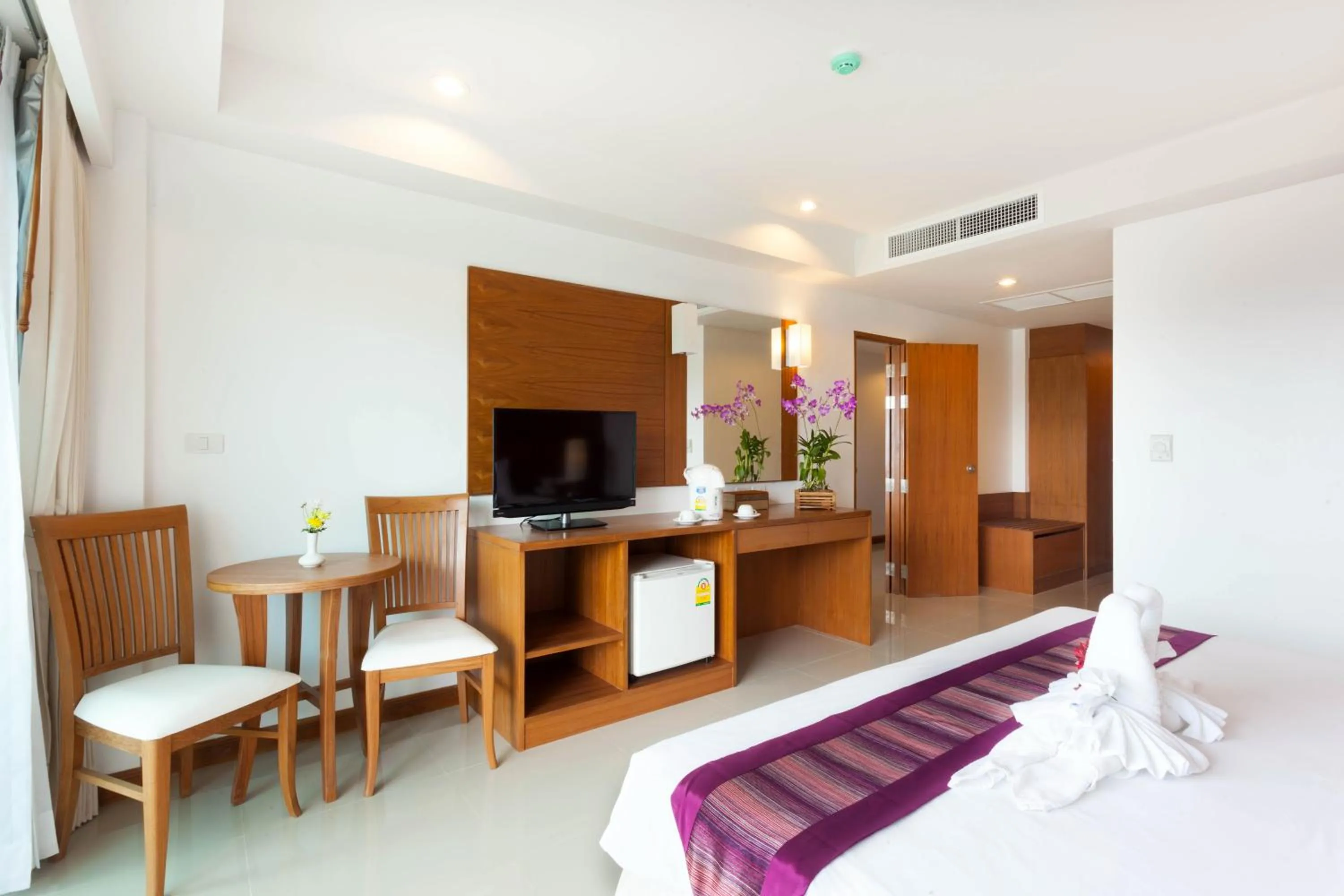 Bed in Rawai Princess Hotel