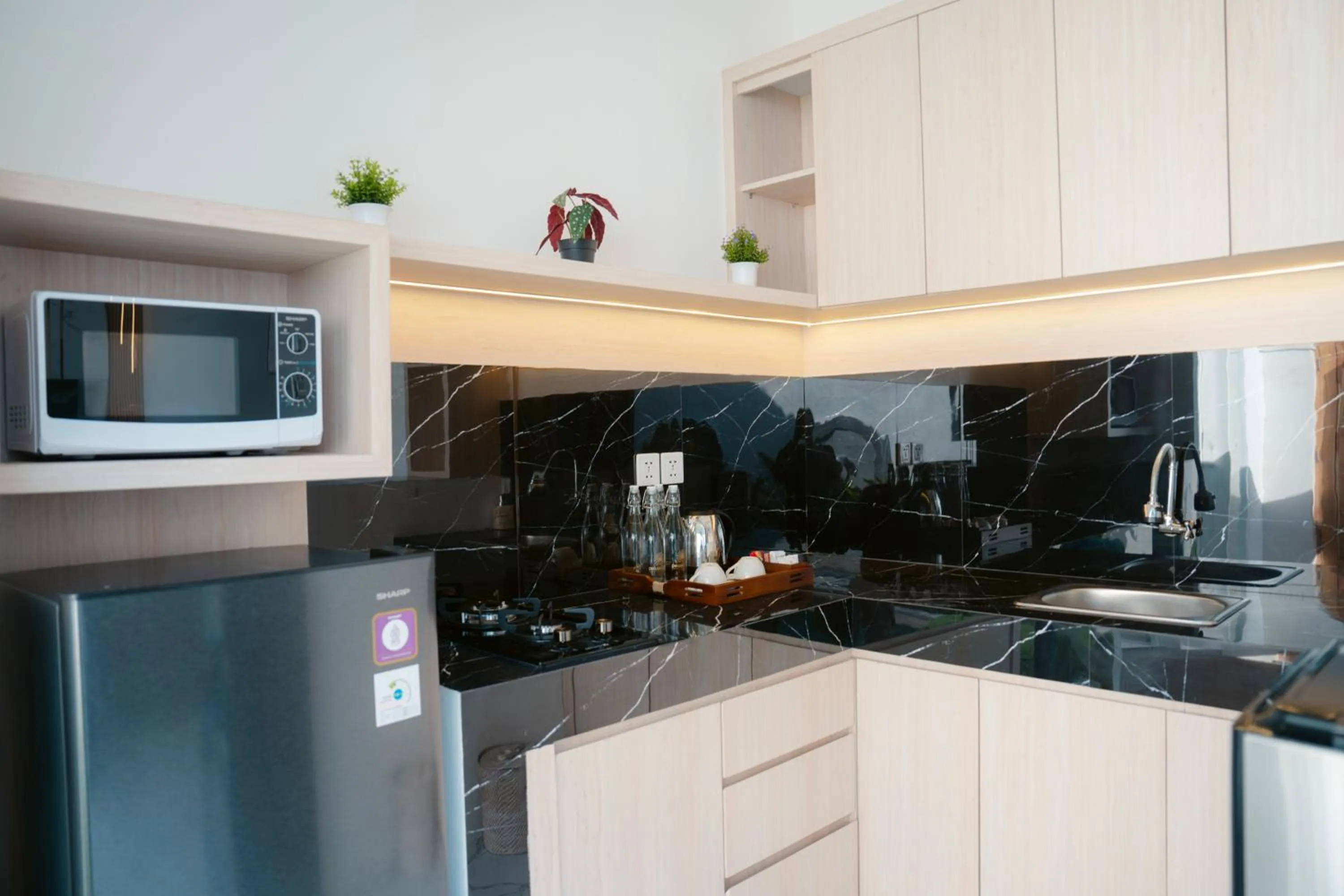 Kitchen or kitchenette in Dikubu Bali Villa and Suites