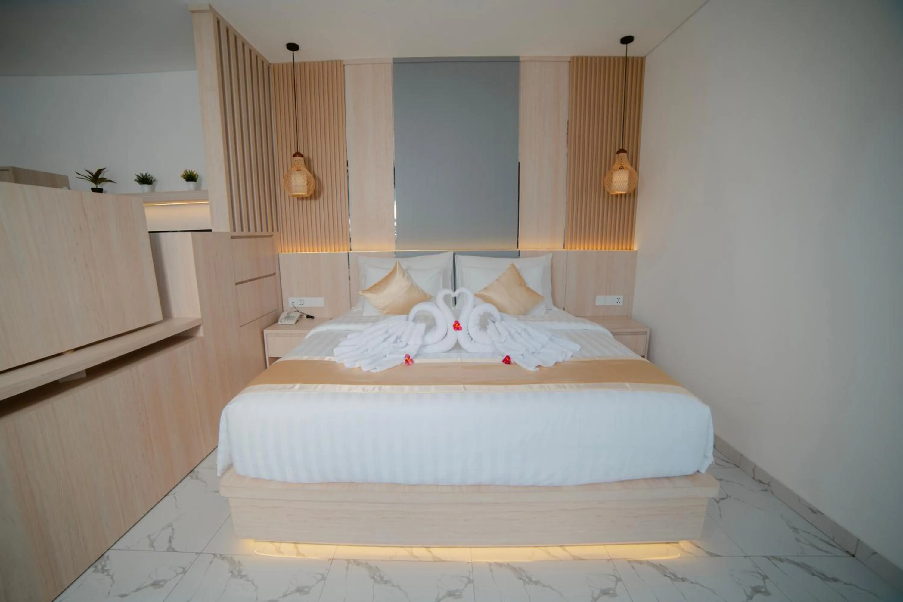 Bed in Dikubu Bali Villa and Suites