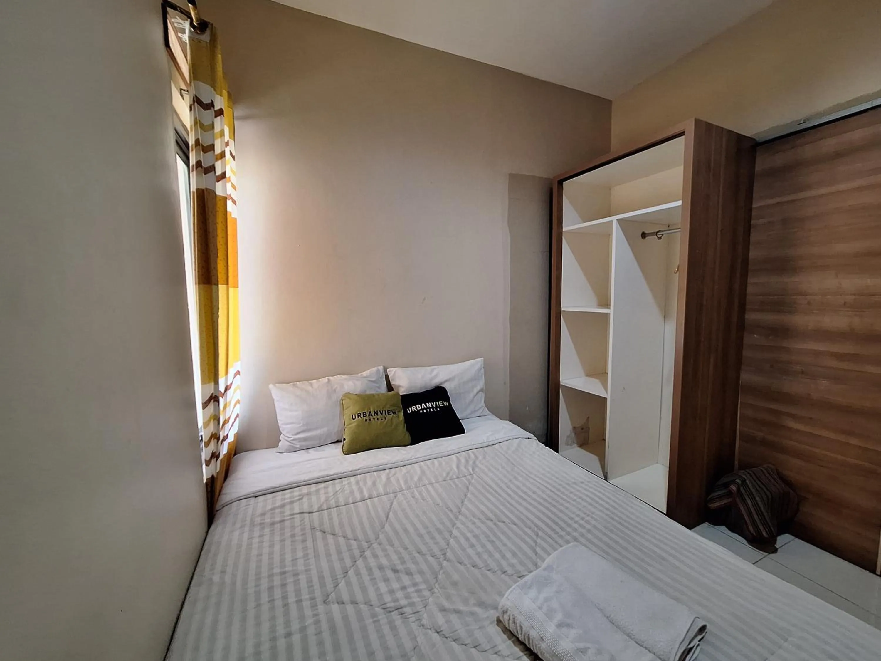 Bedroom, Bed in Urbanview Hotel Inkoppabri Cisarua Puncak