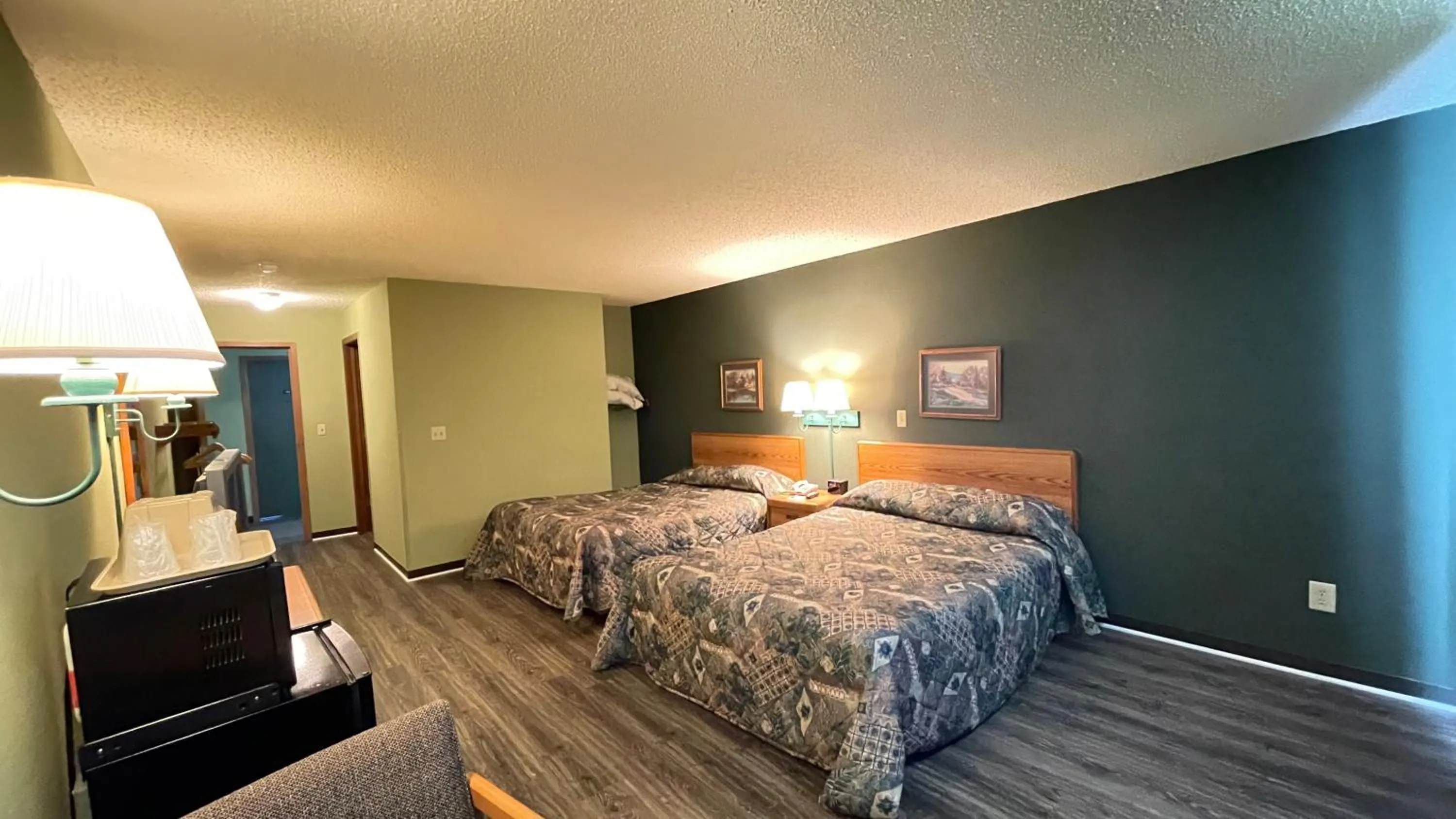 Bed in Harbor Lights Lodge