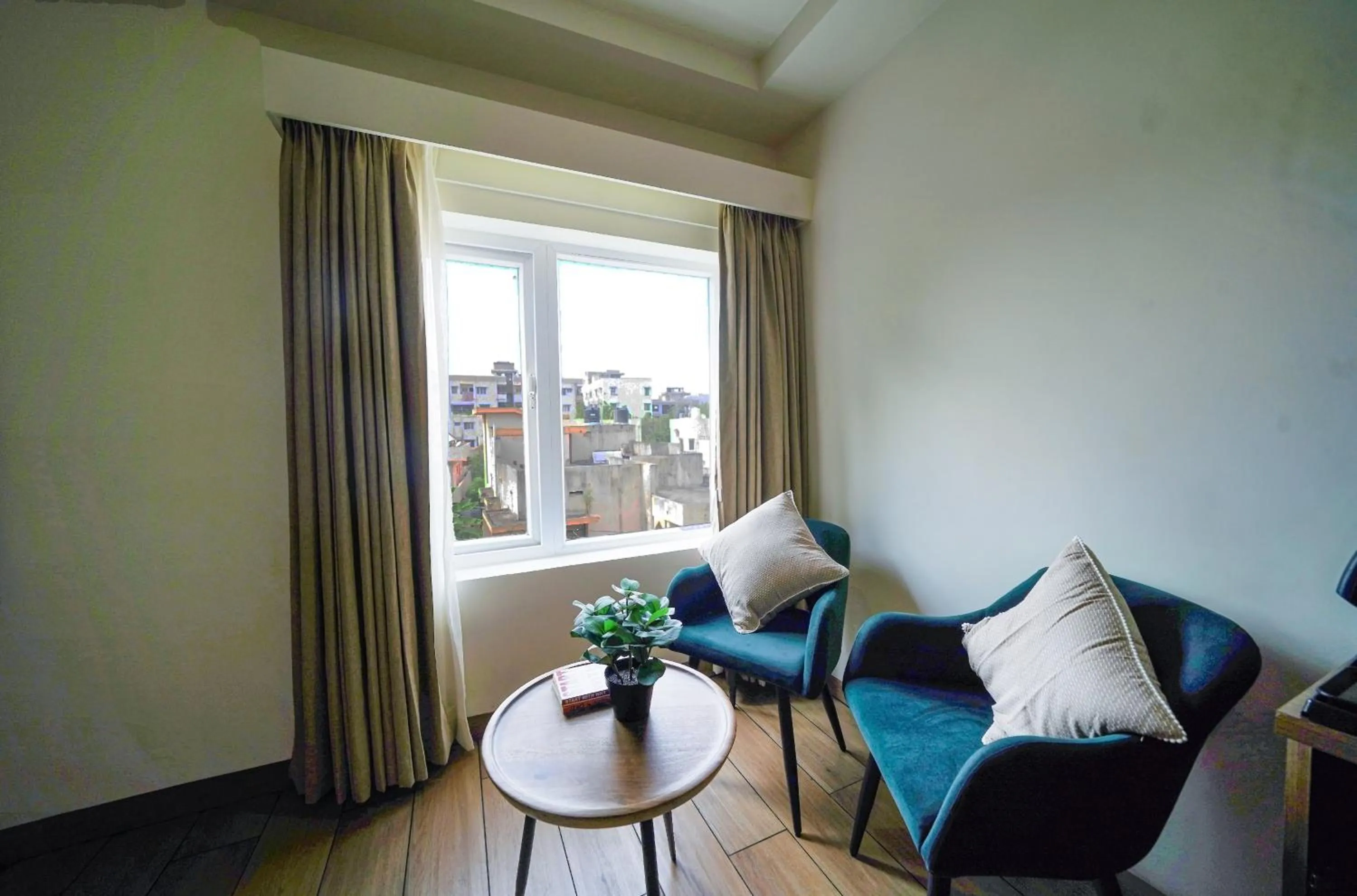 Seating area in Olive Hotel Benz Circle, Vijayawada by Embassy Group