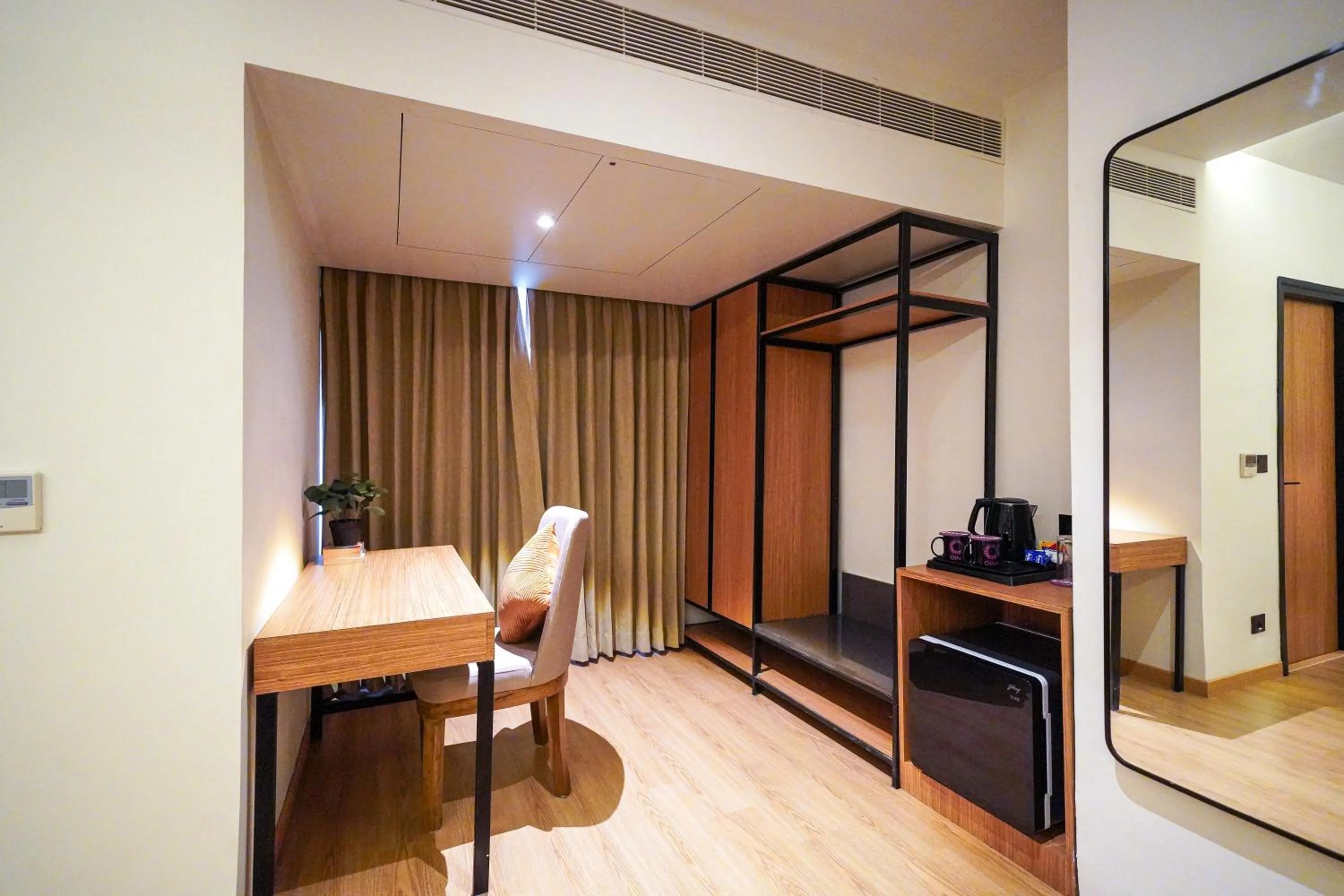 Seating area in Olive Hotel Benz Circle, Vijayawada by Embassy Group