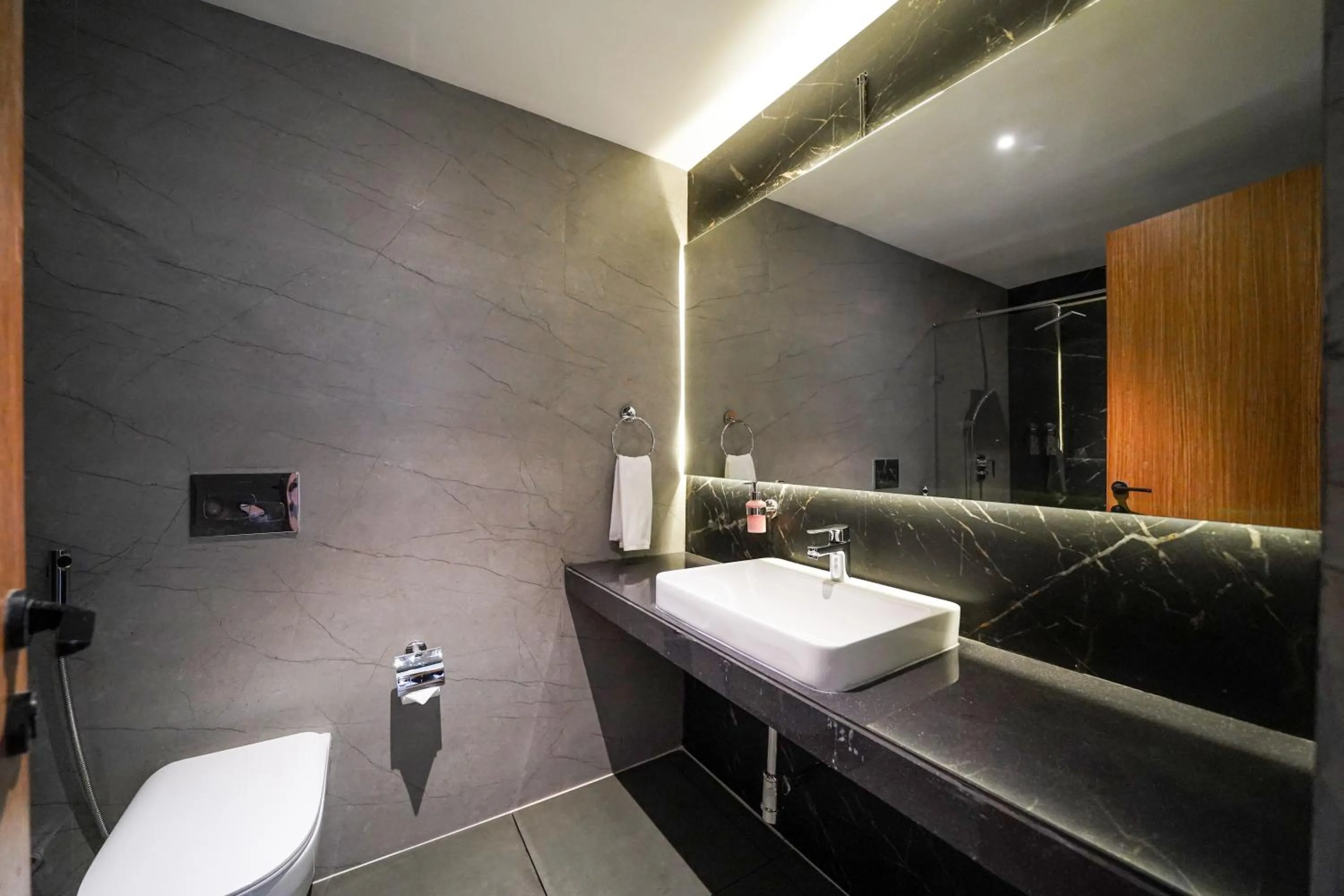 Toilet in Olive Hotel Benz Circle, Vijayawada by Embassy Group