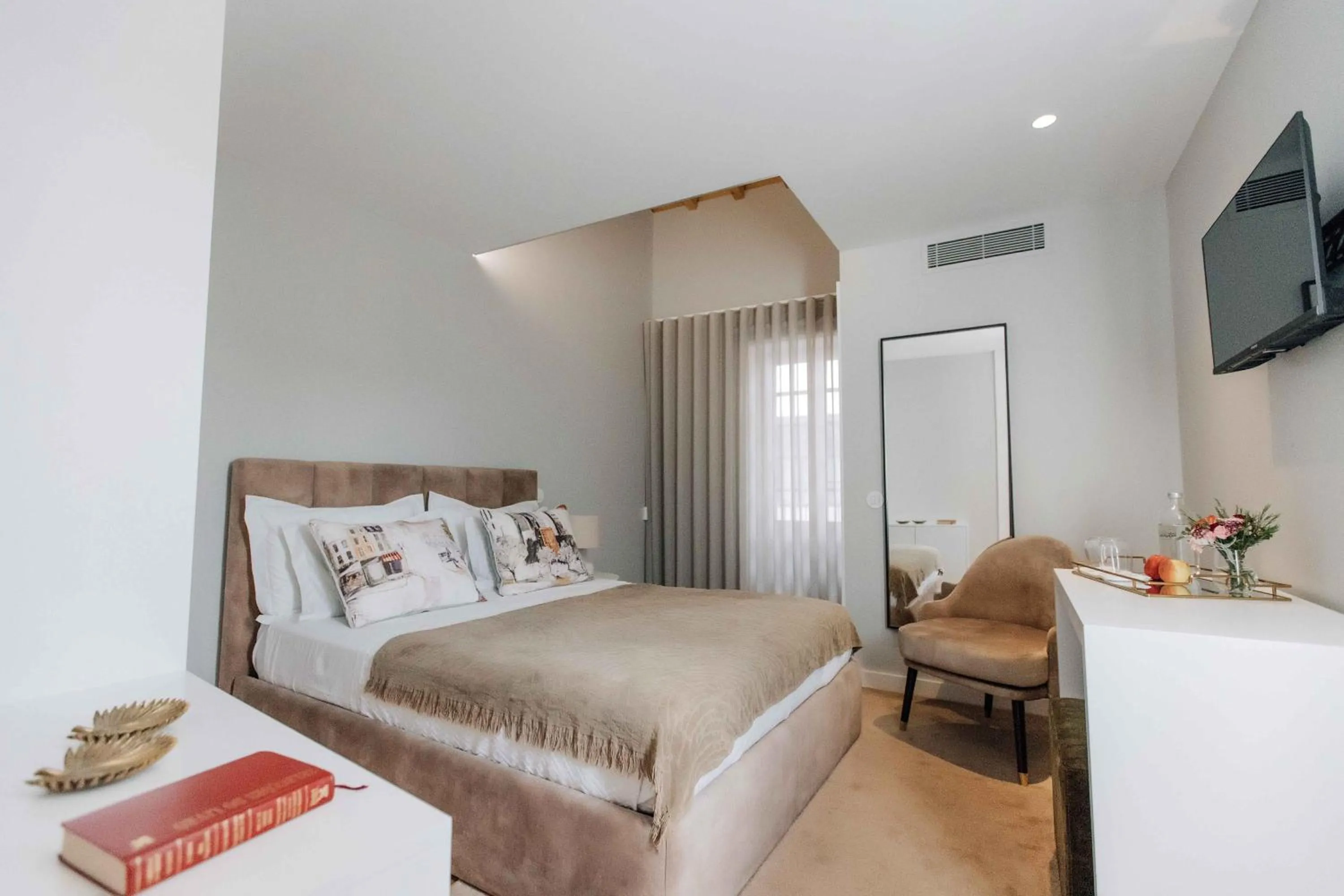 Bed in Trovador Guest House