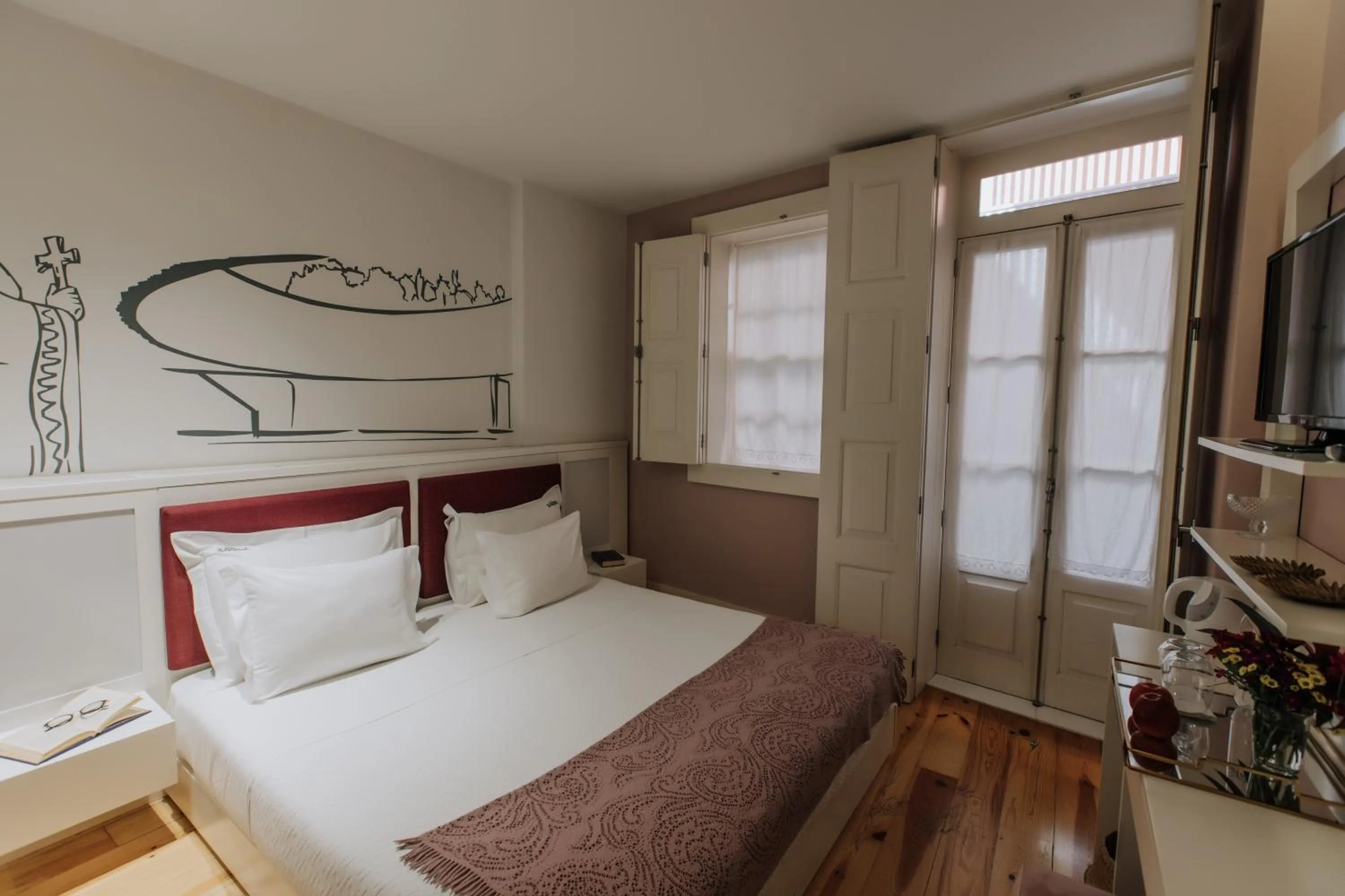 Bed in Trovador Guest House