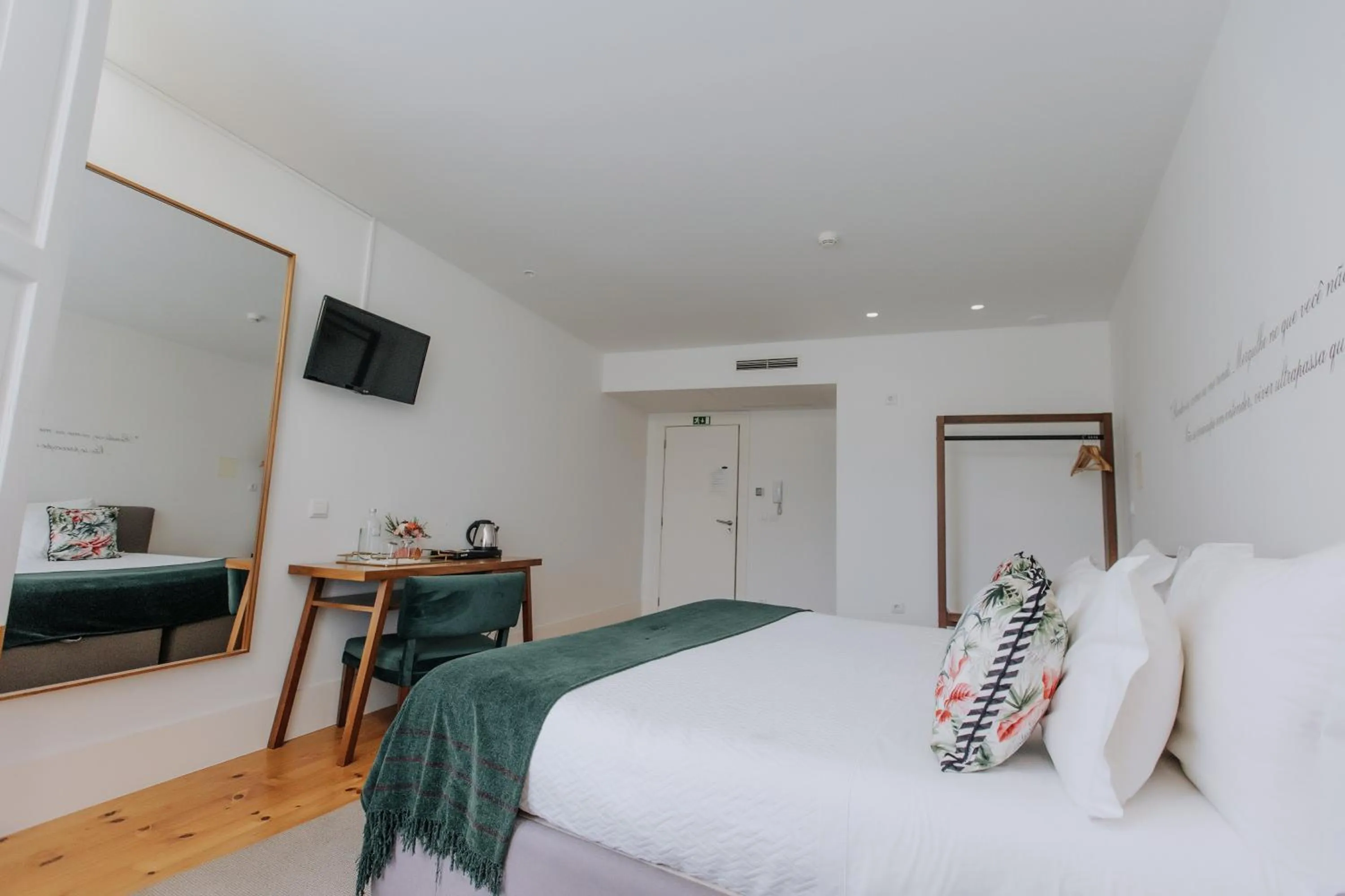 Bed in Trovador Guest House