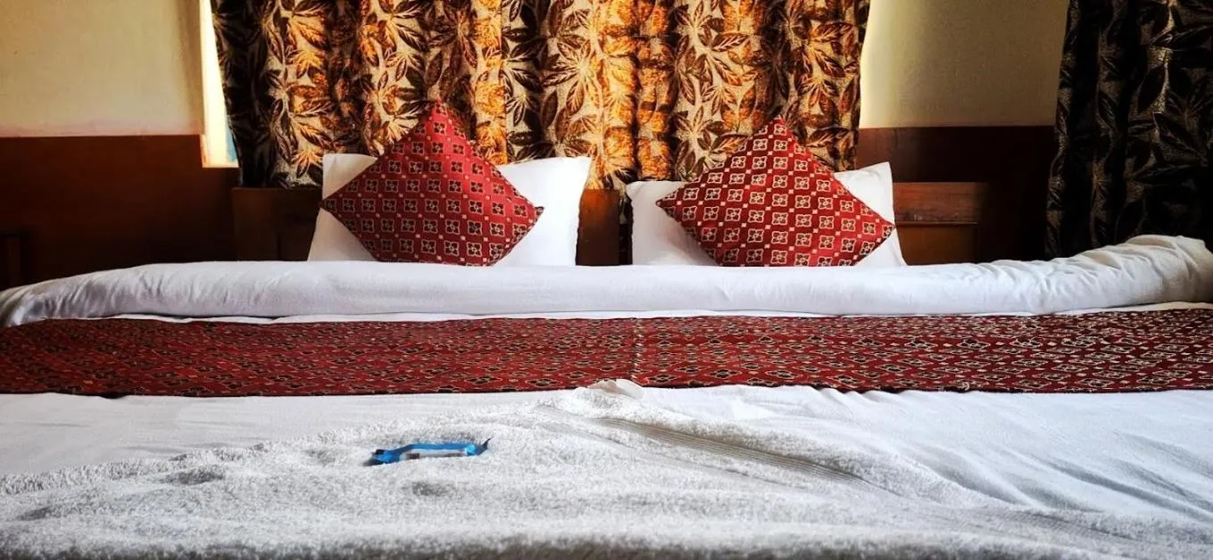 Bed in Hotel Deep Oasis Pokhara