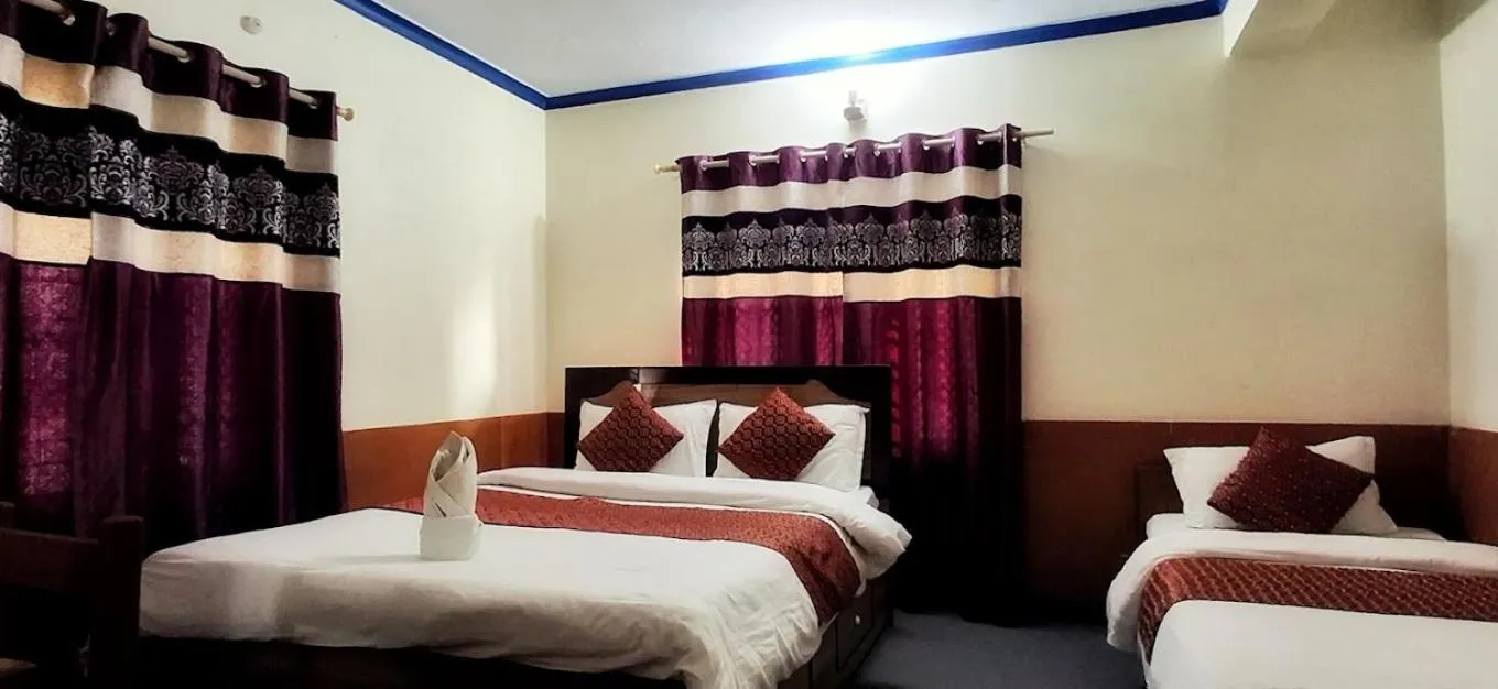 Bed in Hotel Deep Oasis Pokhara