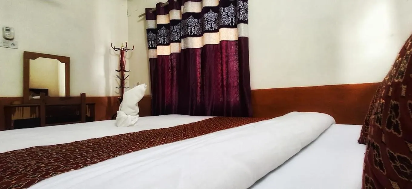 Bed in Hotel Deep Oasis Pokhara