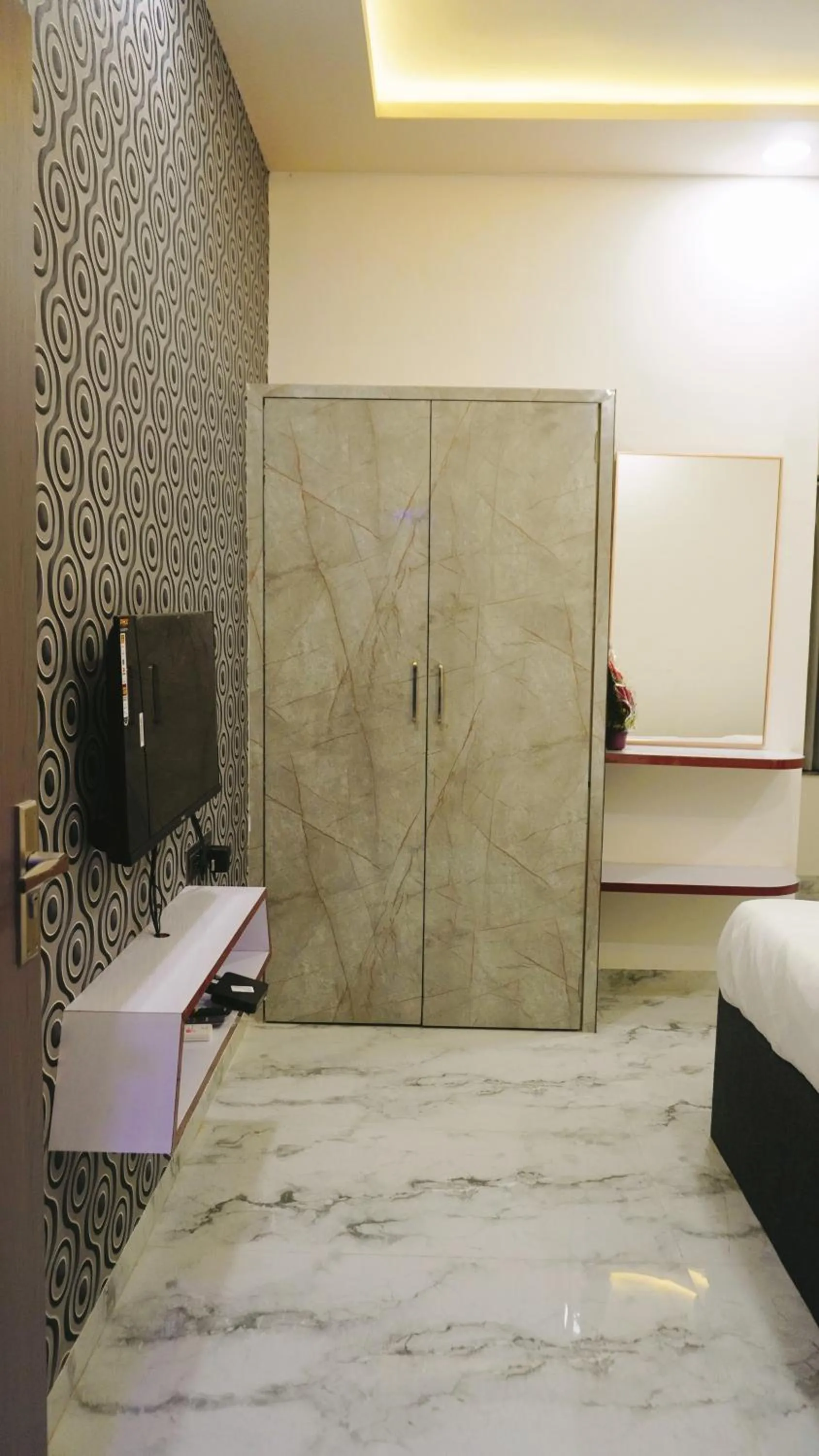 wardrobe, Bed in Hotel Sahara Residency