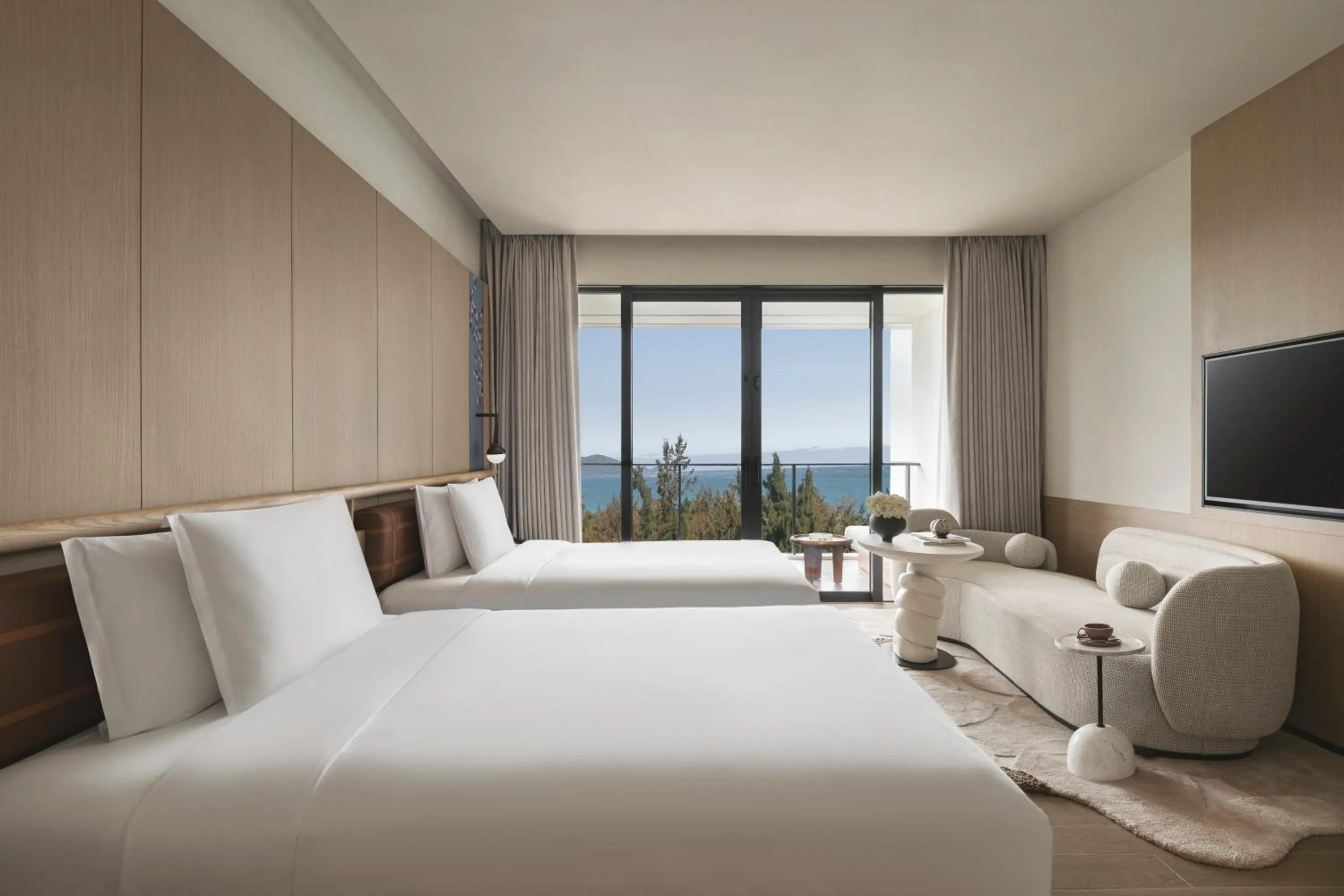 Photo of the whole room, Bed in Hotel Indigo Hainan Clear Water Bay by IHG