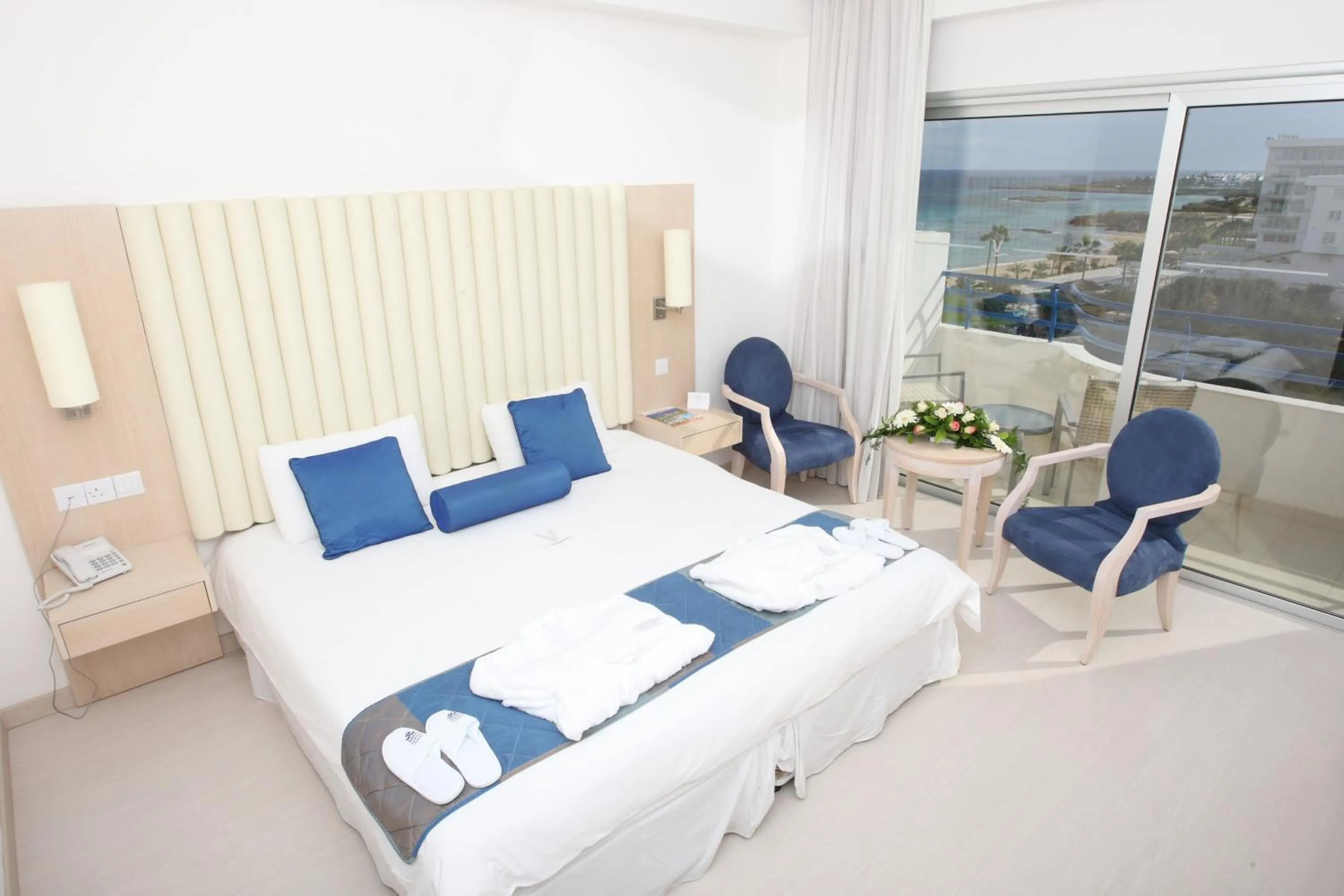 Bed in Vrissiana Boutique Beach Hotel