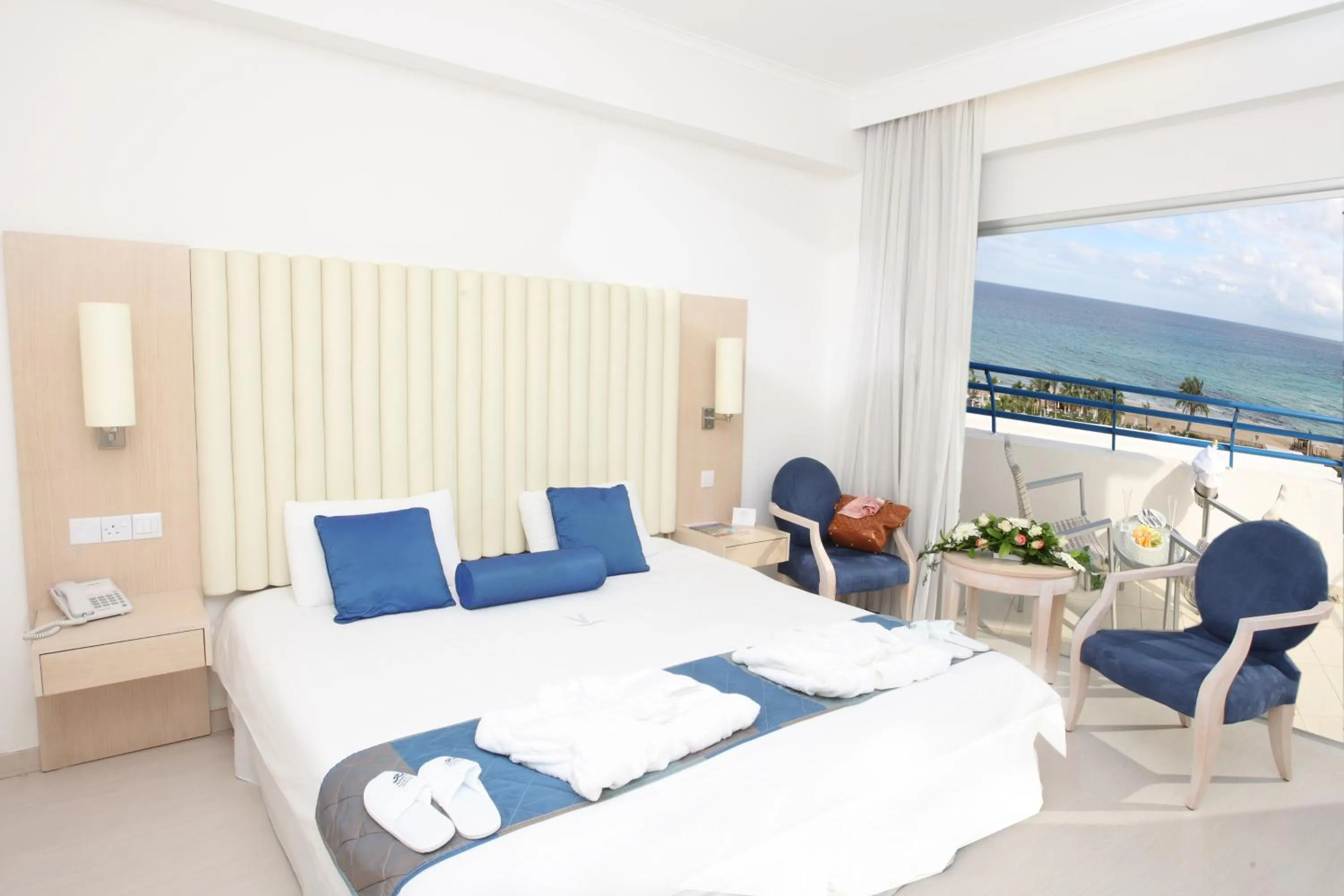 Bed in Vrissiana Boutique Beach Hotel