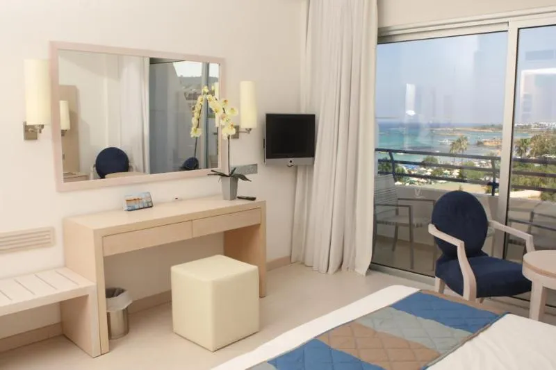 TV and multimedia in Vrissiana Boutique Beach Hotel