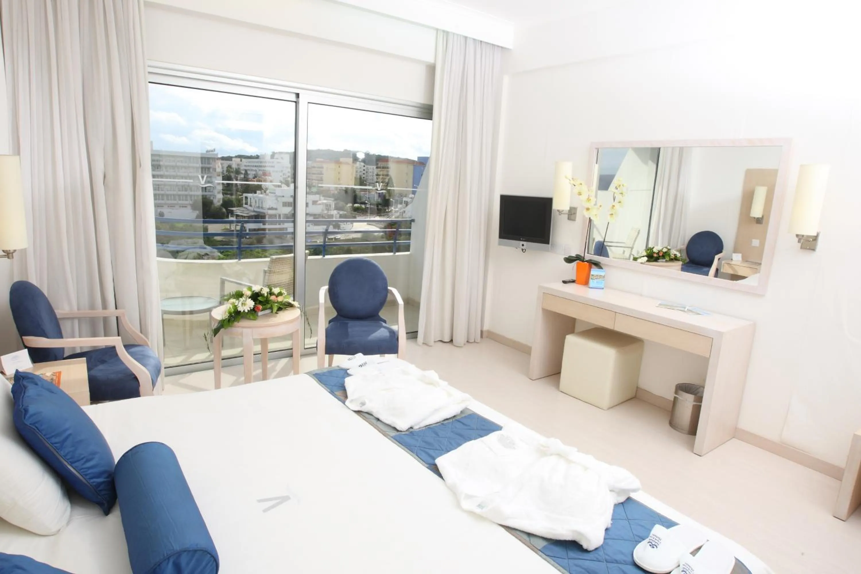 Bed in Vrissiana Boutique Beach Hotel