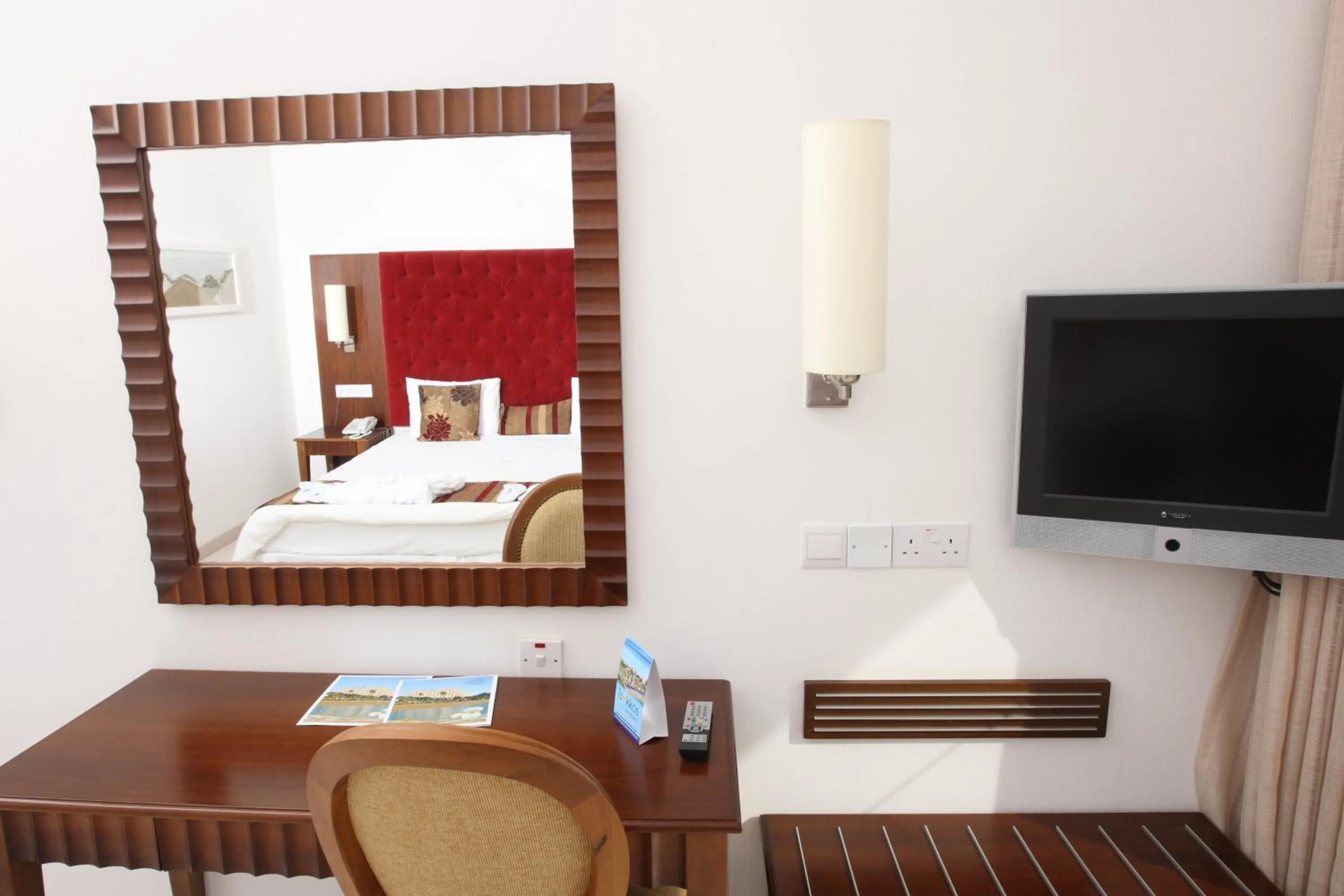 Bed in Vrissiana Boutique Beach Hotel