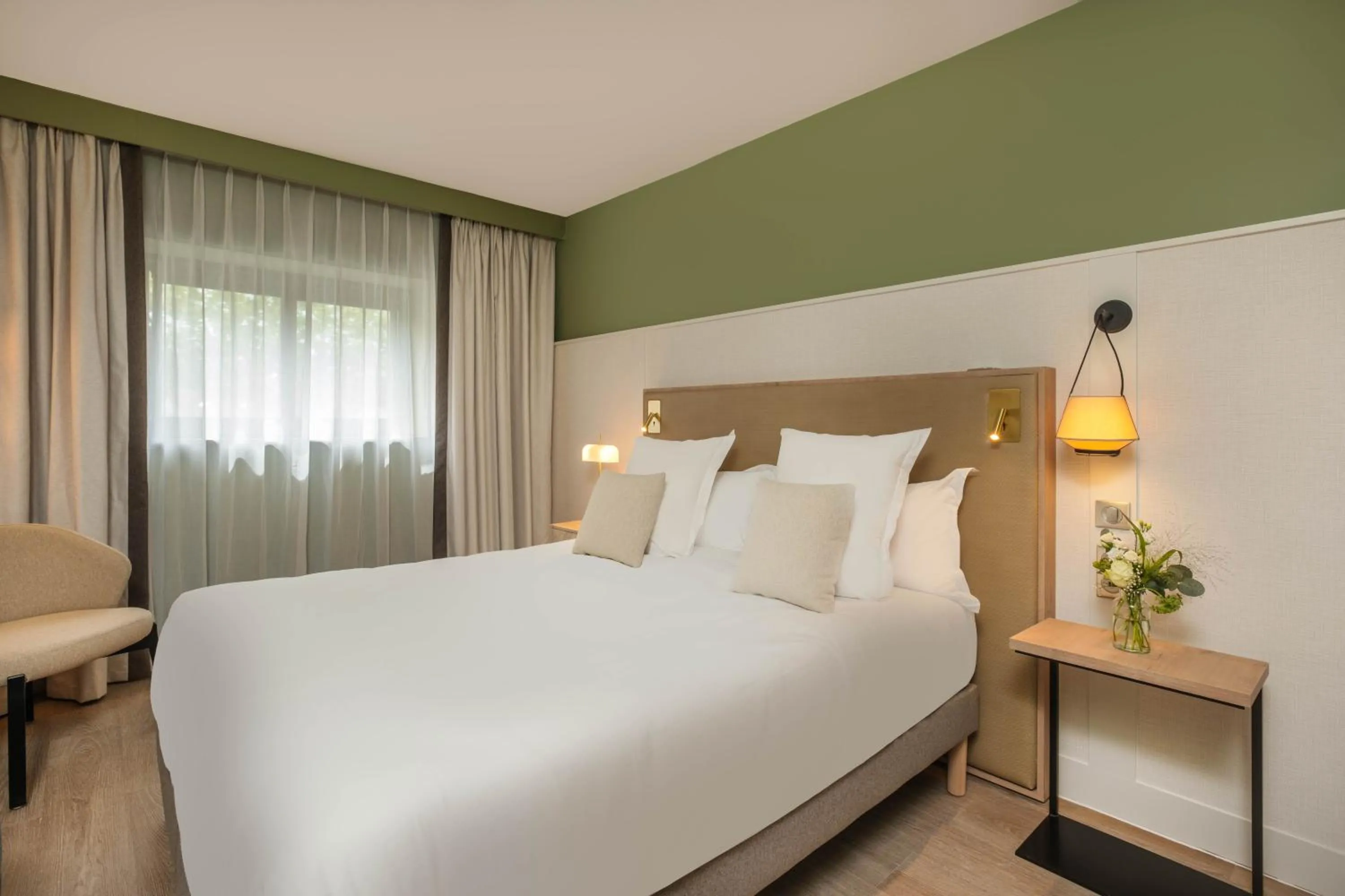 Bedroom, Bed in Hôtel Arcanse by Inwood Hotels