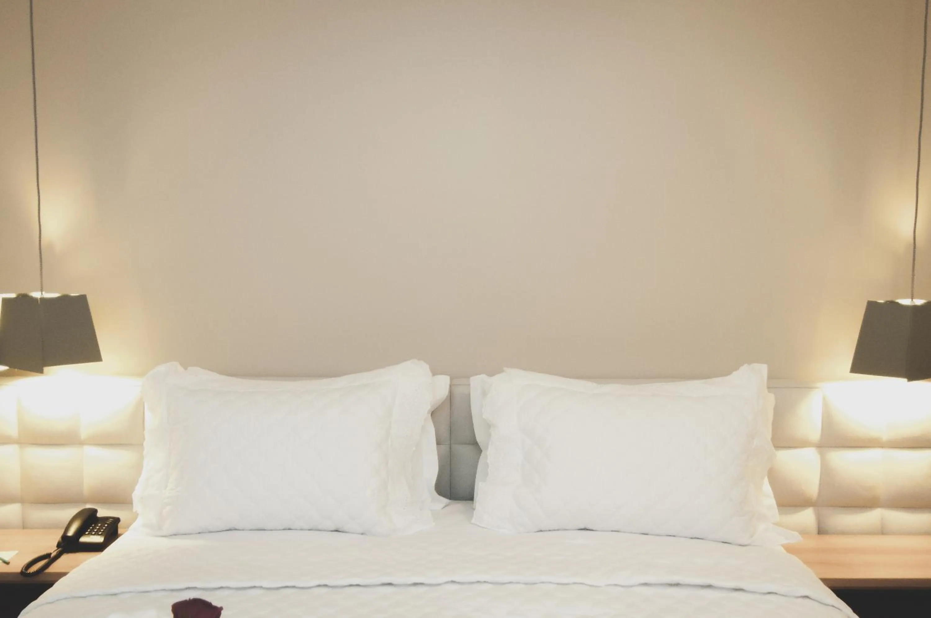 Bed in Nobile Suites Gran Lumni