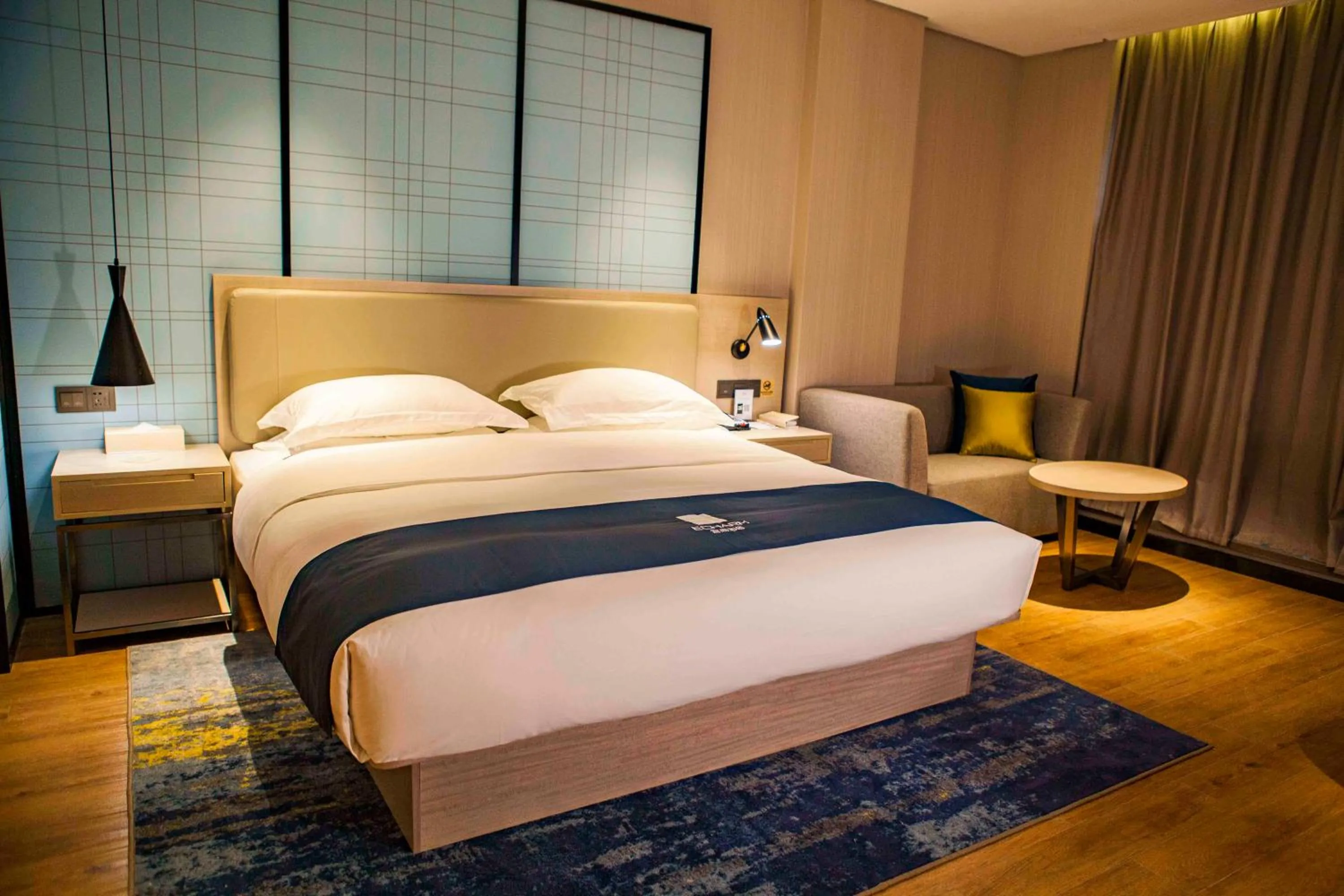 Photo of the whole room, Bed in Echarm Hotel Dongxing Minzu Road