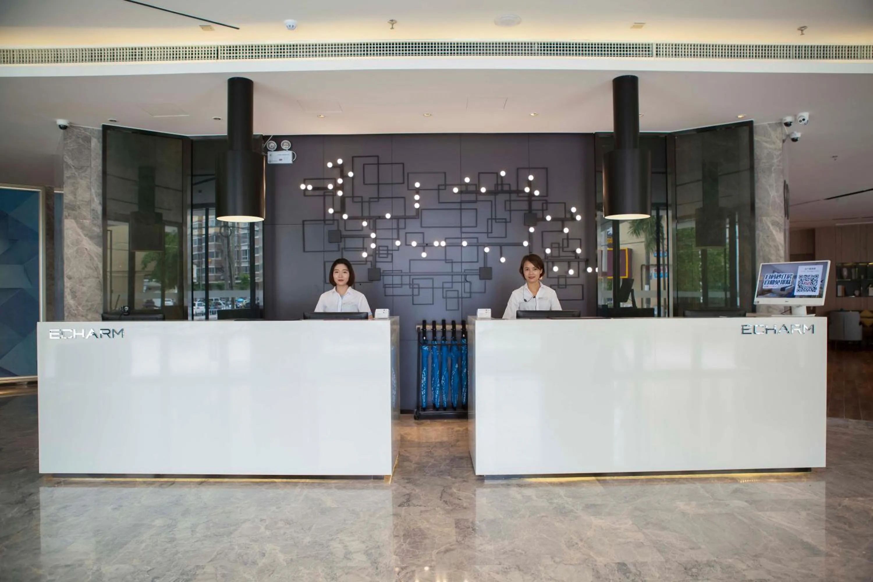 Lobby or reception in Echarm Hotel Dongxing Minzu Road
