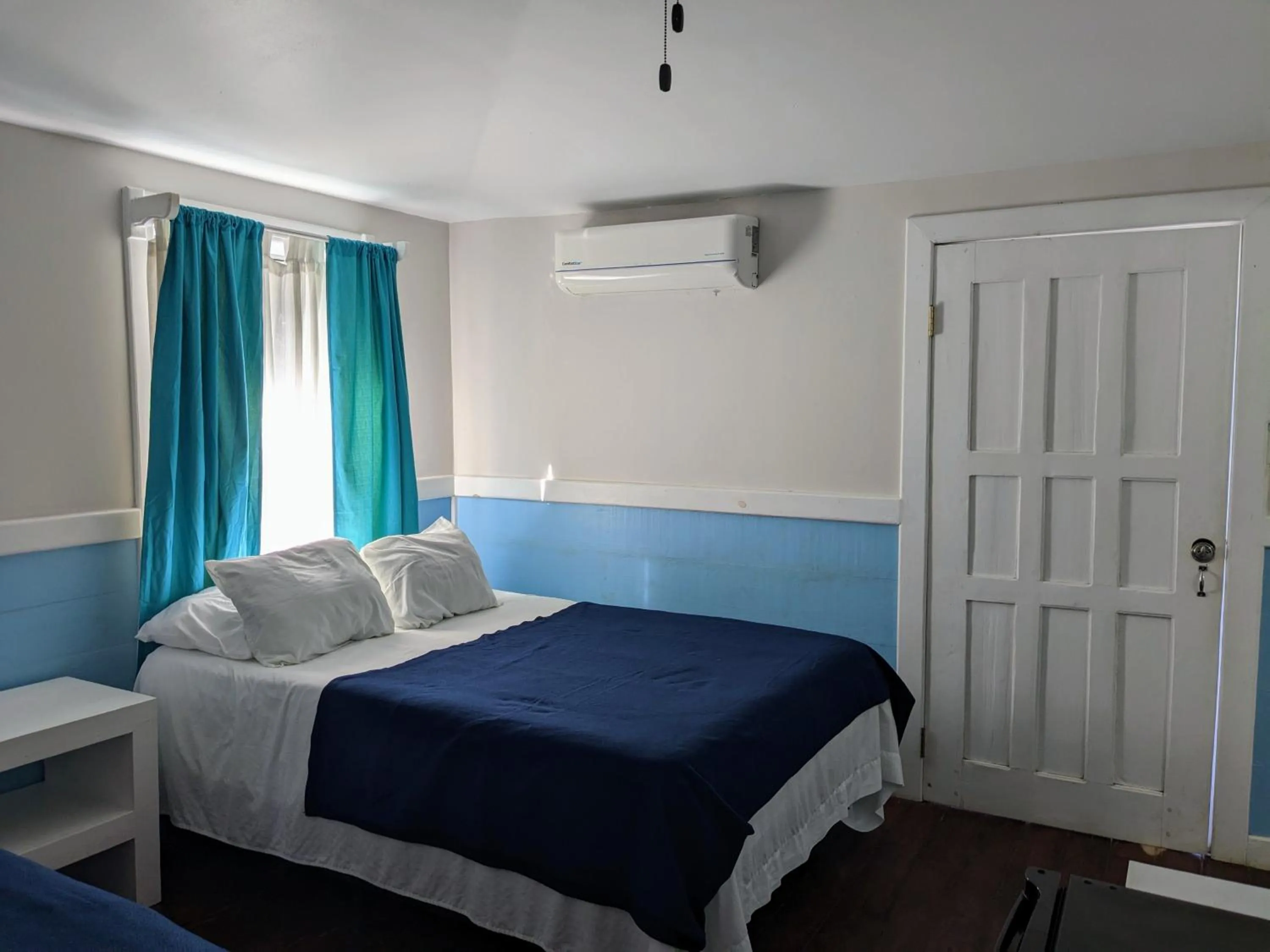 Bed in Coral Beach Village Resort