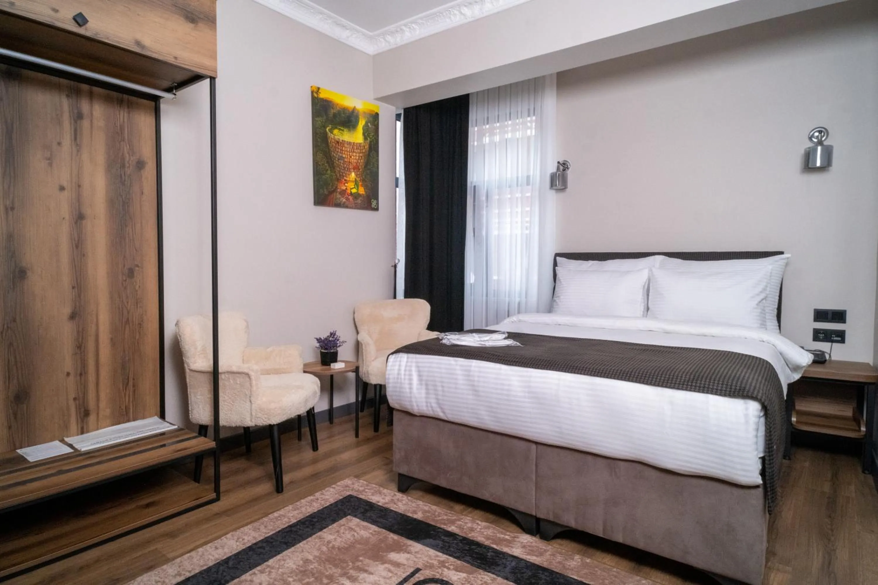 Bed in Grand CLOVER Hotel