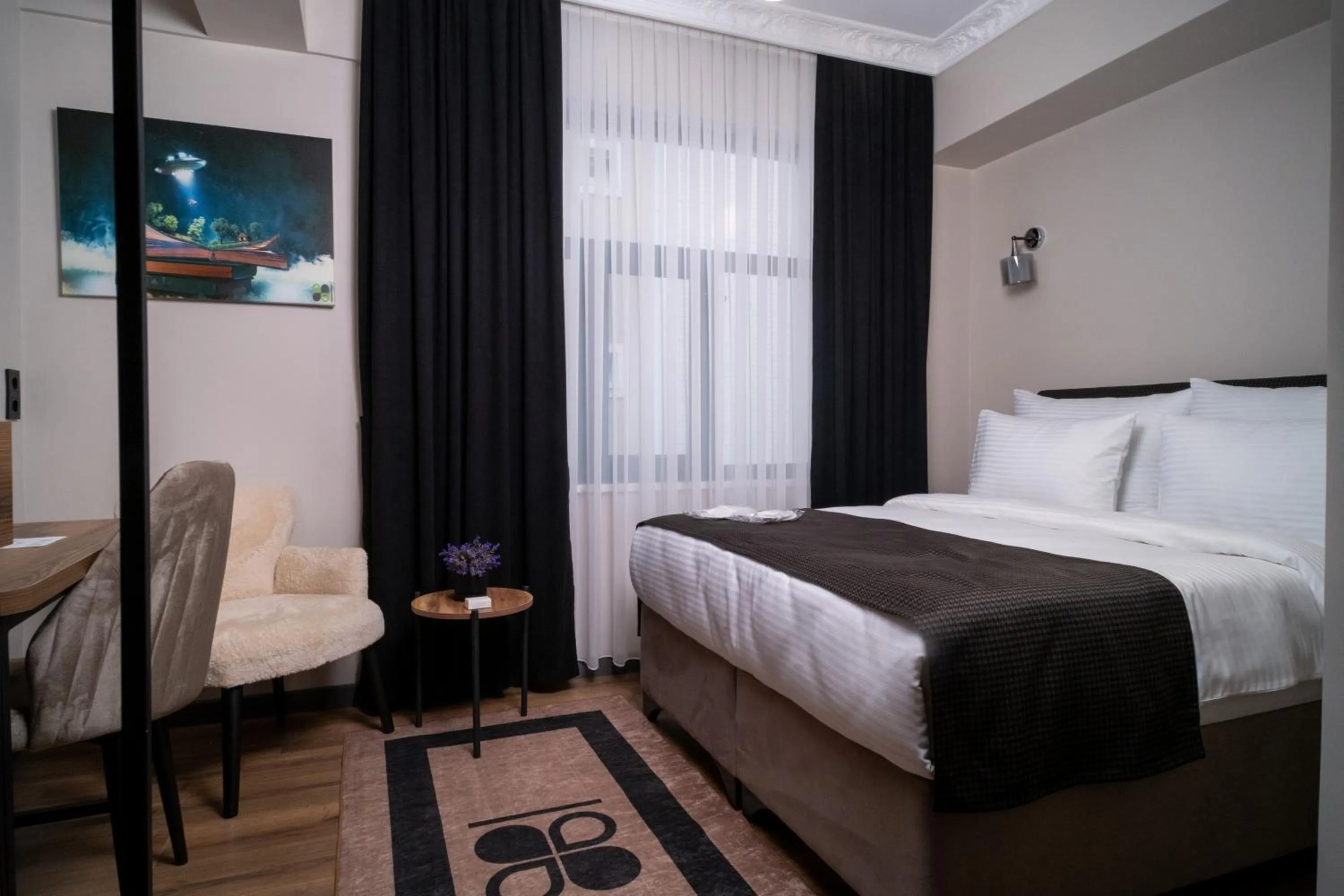 Bed in Grand CLOVER Hotel