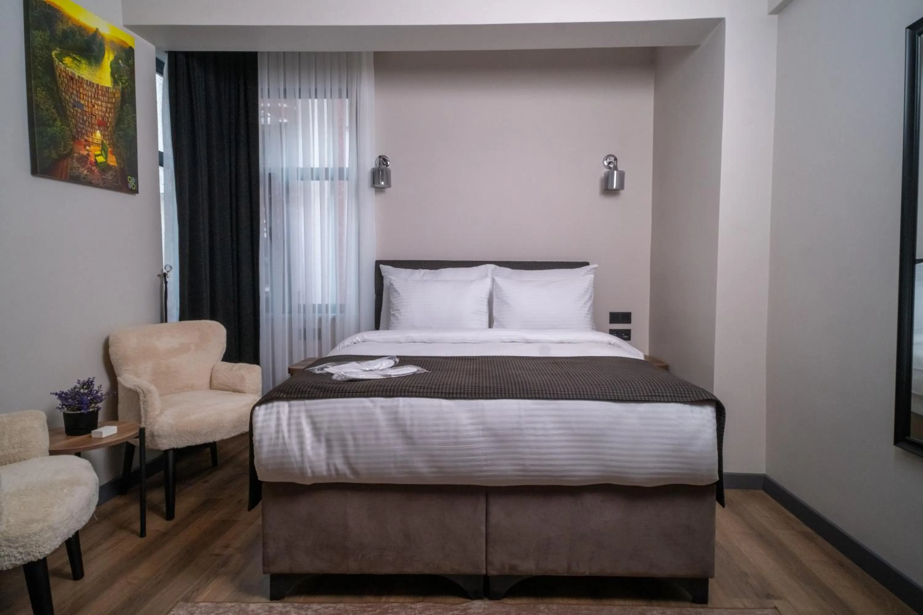 Bed in Grand CLOVER Hotel