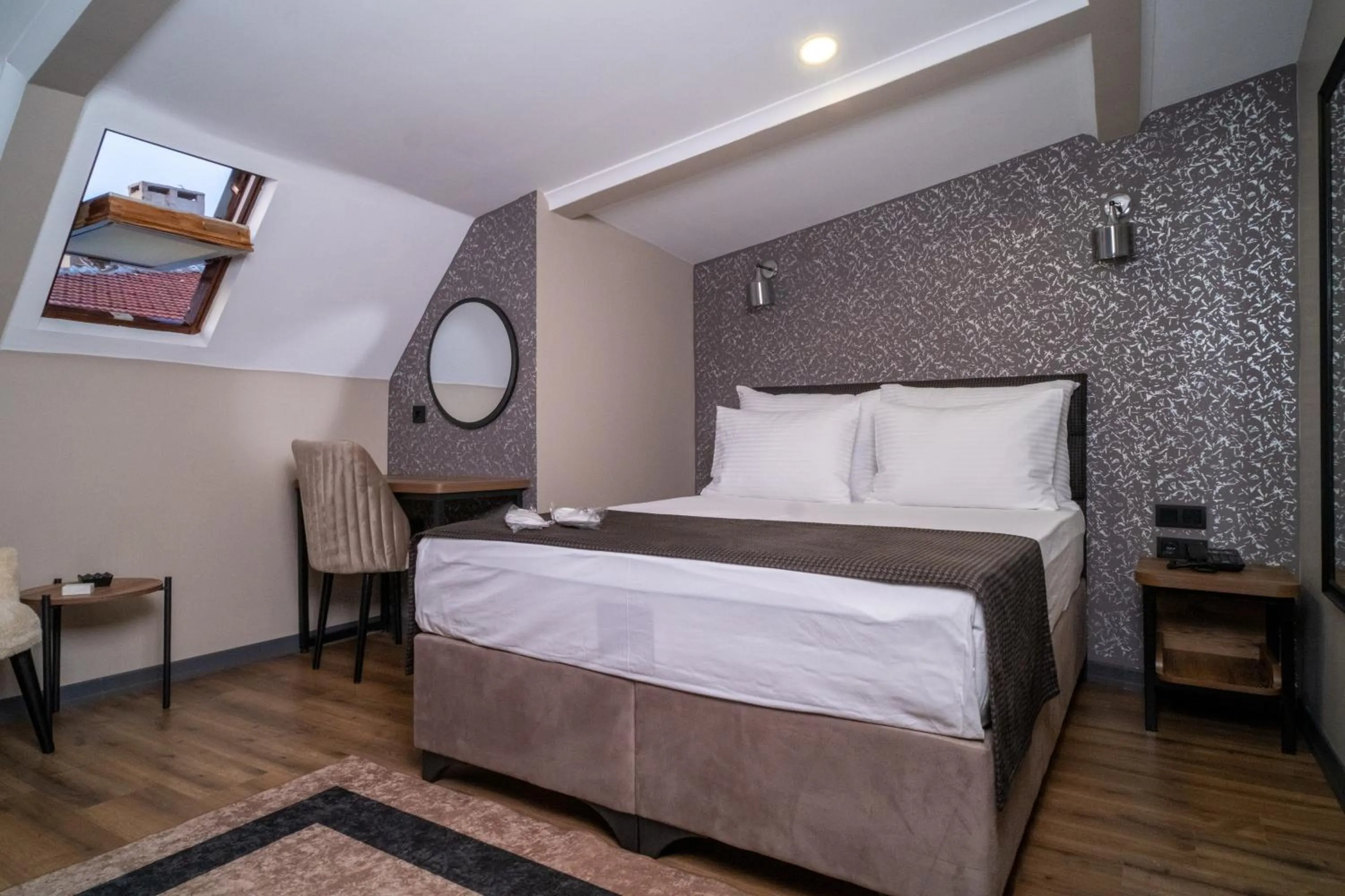 Bed in Grand CLOVER Hotel