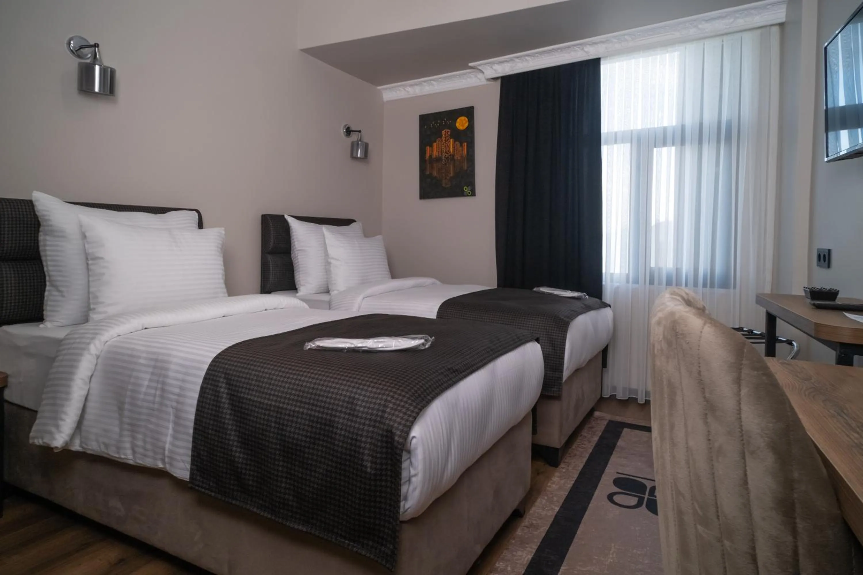 Bed in Grand CLOVER Hotel