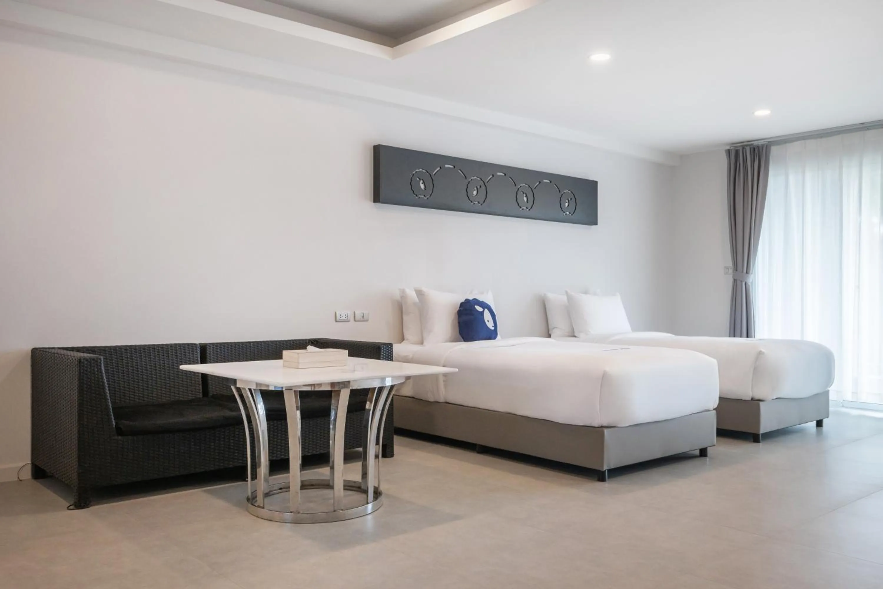 Bed in Kokotel Khao Lak Isara Casa