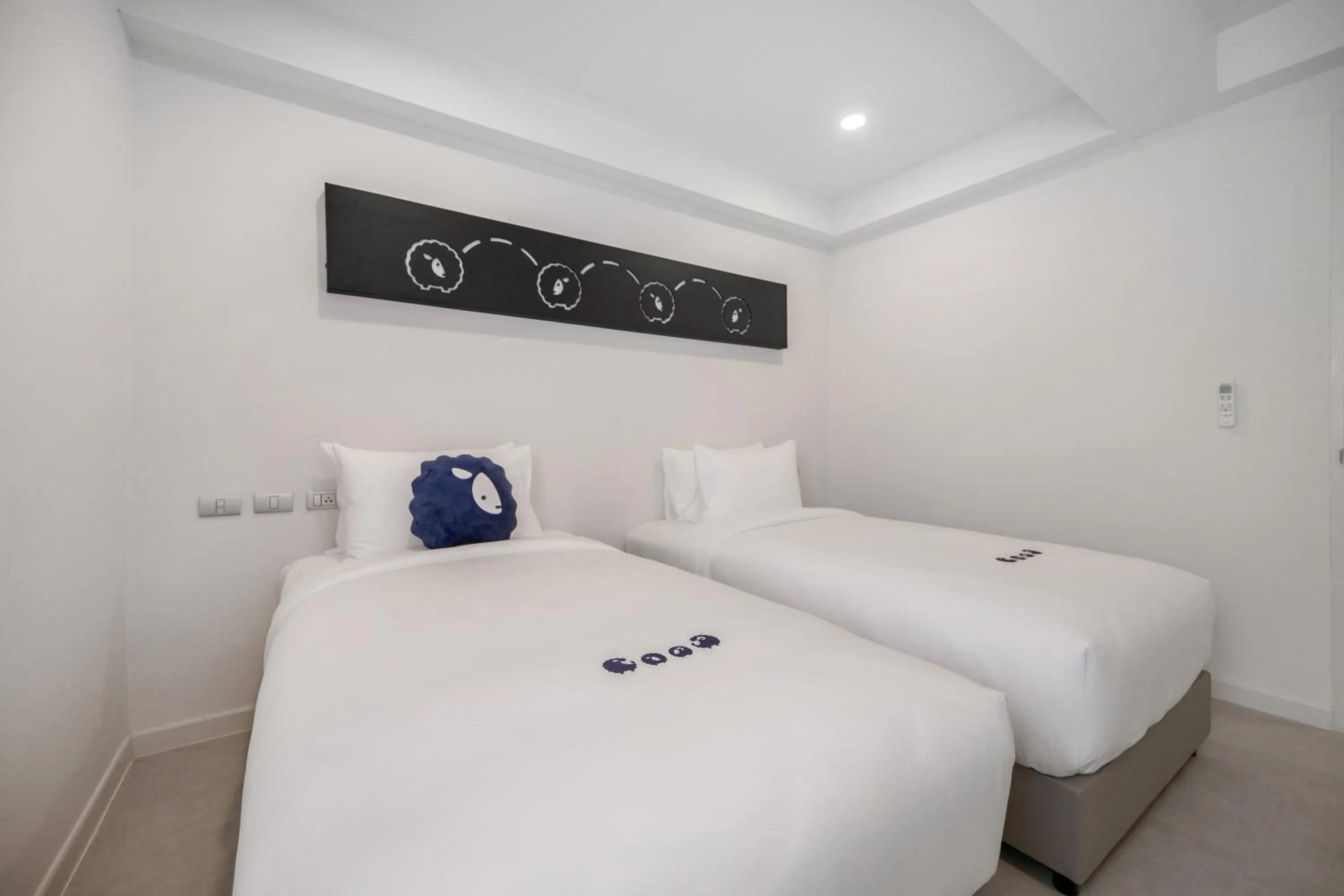 Bed in Kokotel Khao Lak Isara Casa