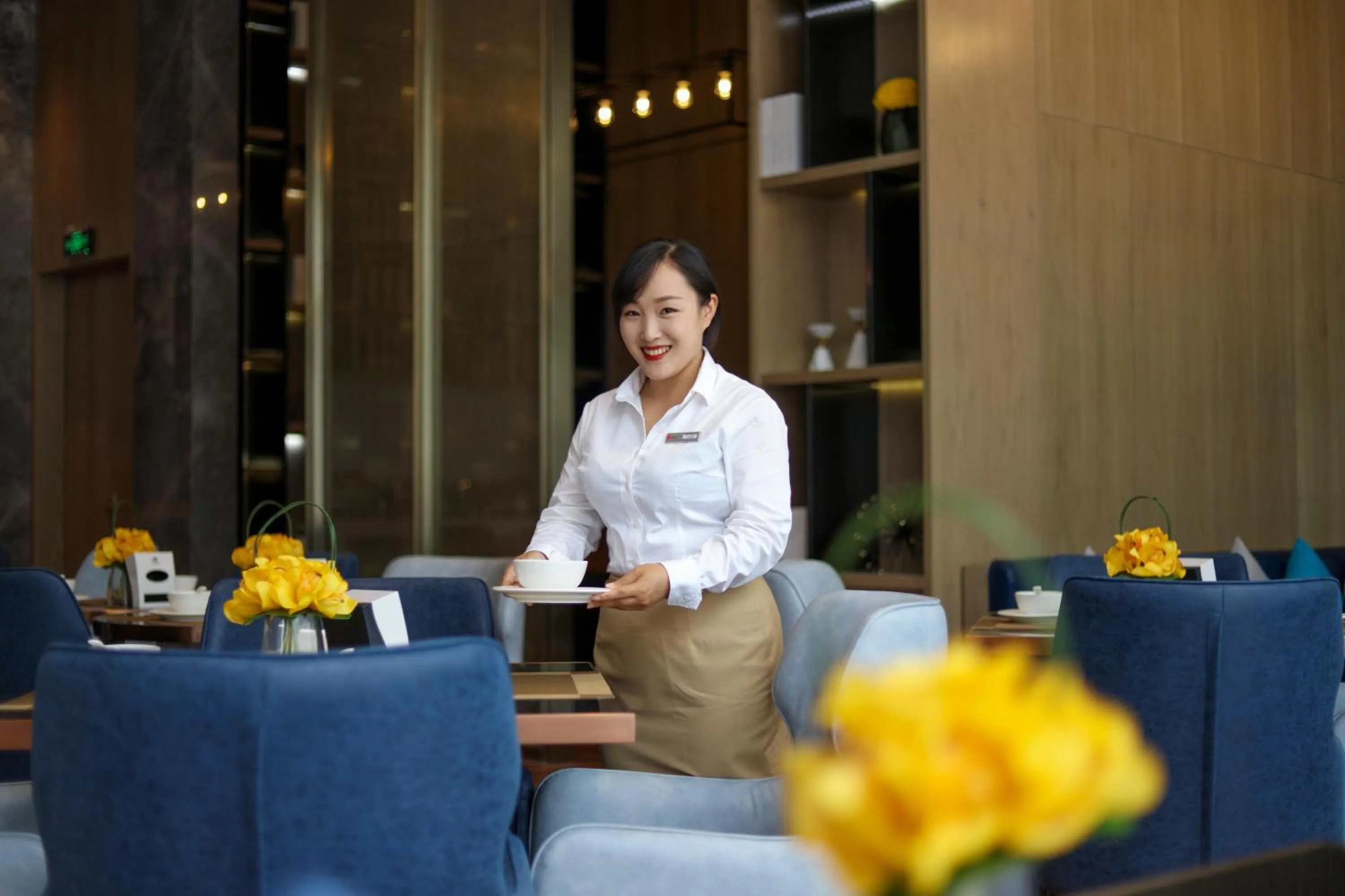 Staff in Echarm Hotel Mile Branch