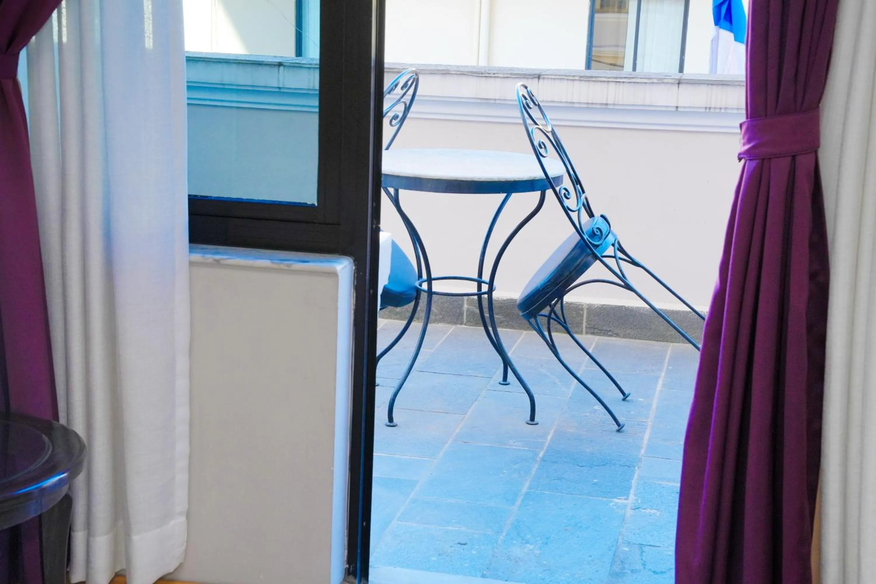 Balcony/Terrace in Hotel Harmika - Spiritual retreat with garden & Stupa view