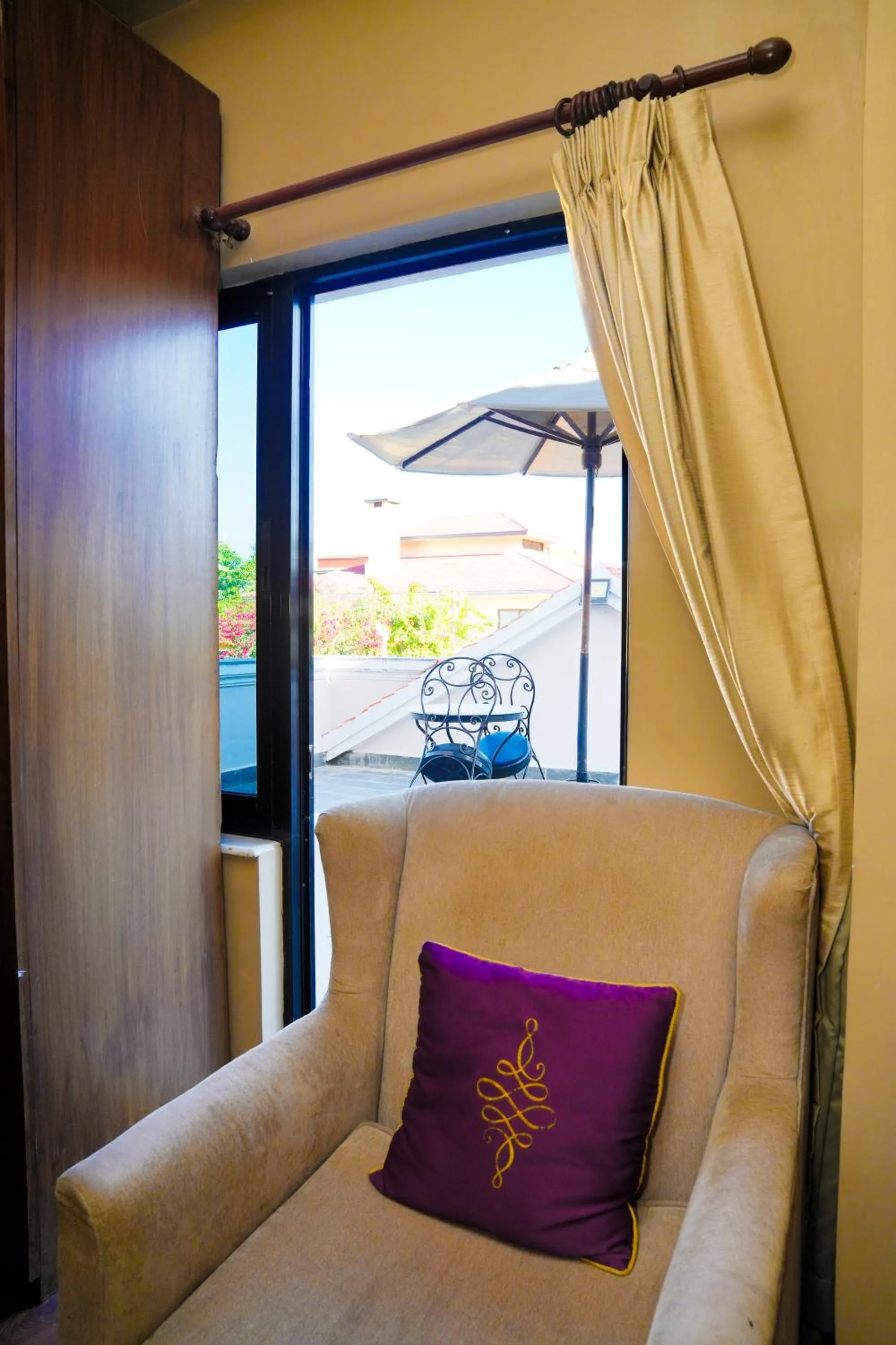 Balcony/Terrace in Hotel Harmika - Spiritual retreat with garden & Stupa view