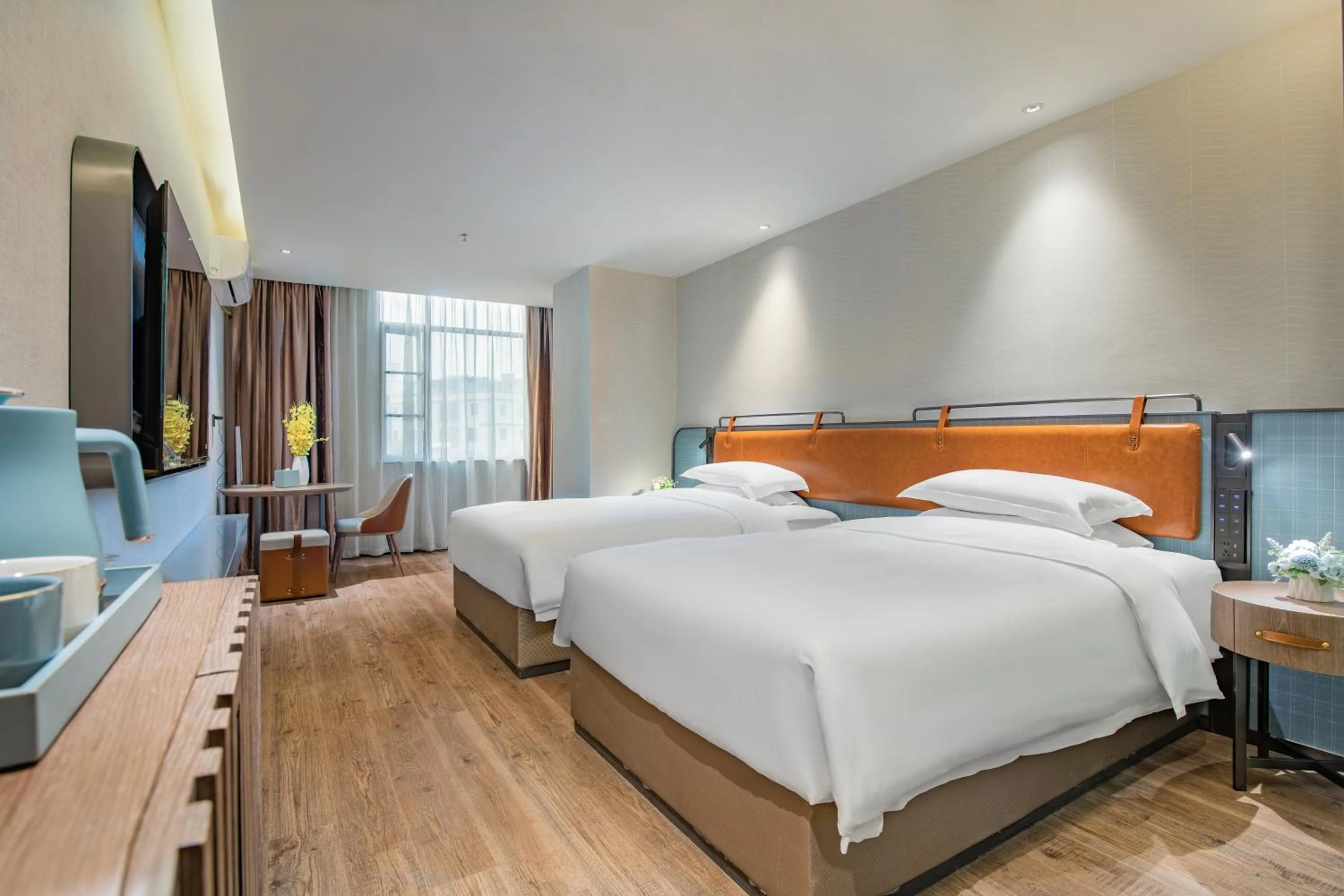 Bed in Echarm Hotel Guangzhou Jiahe Helong Branch