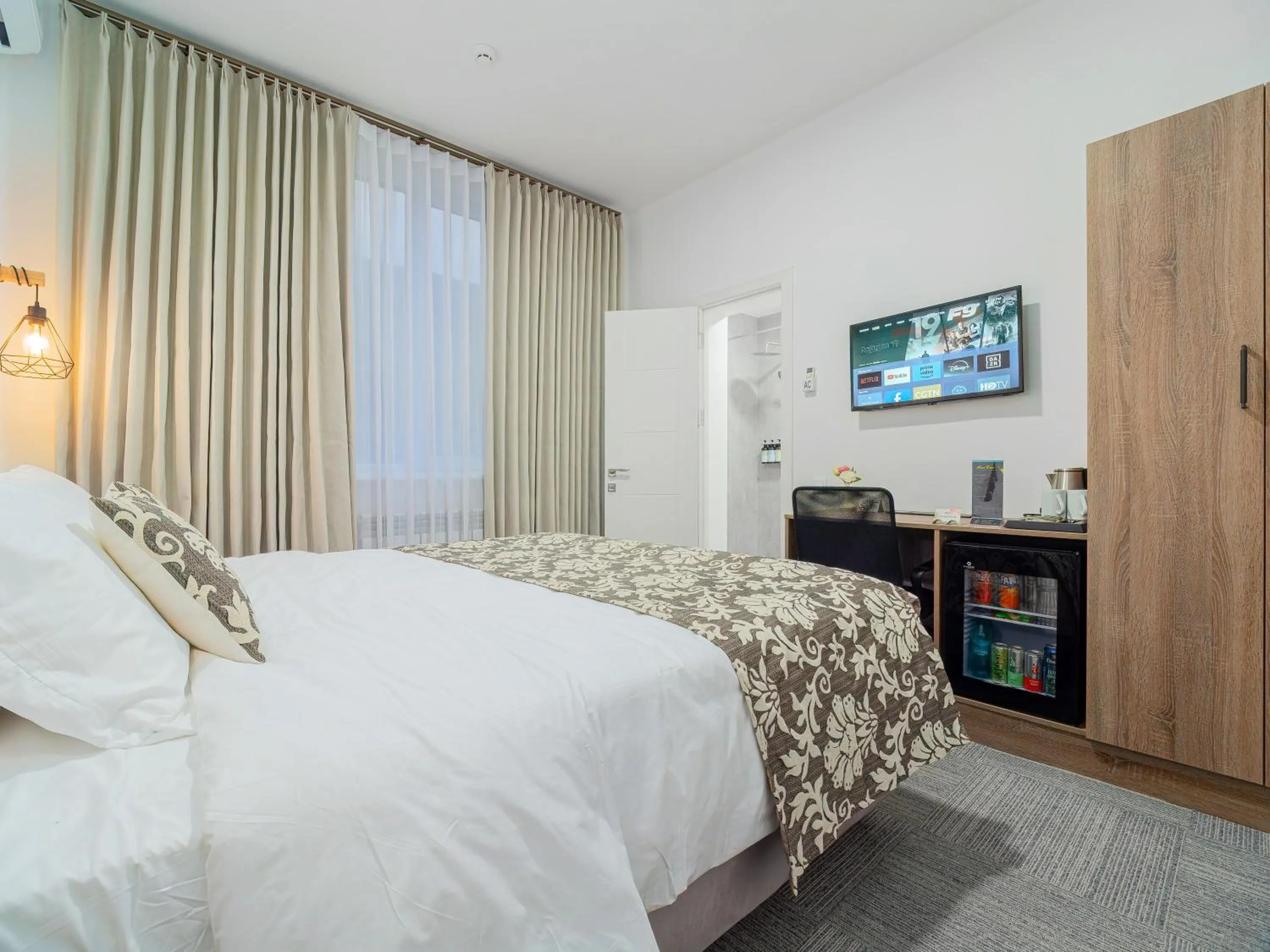 minibar, Bed in TA Collection Hotel