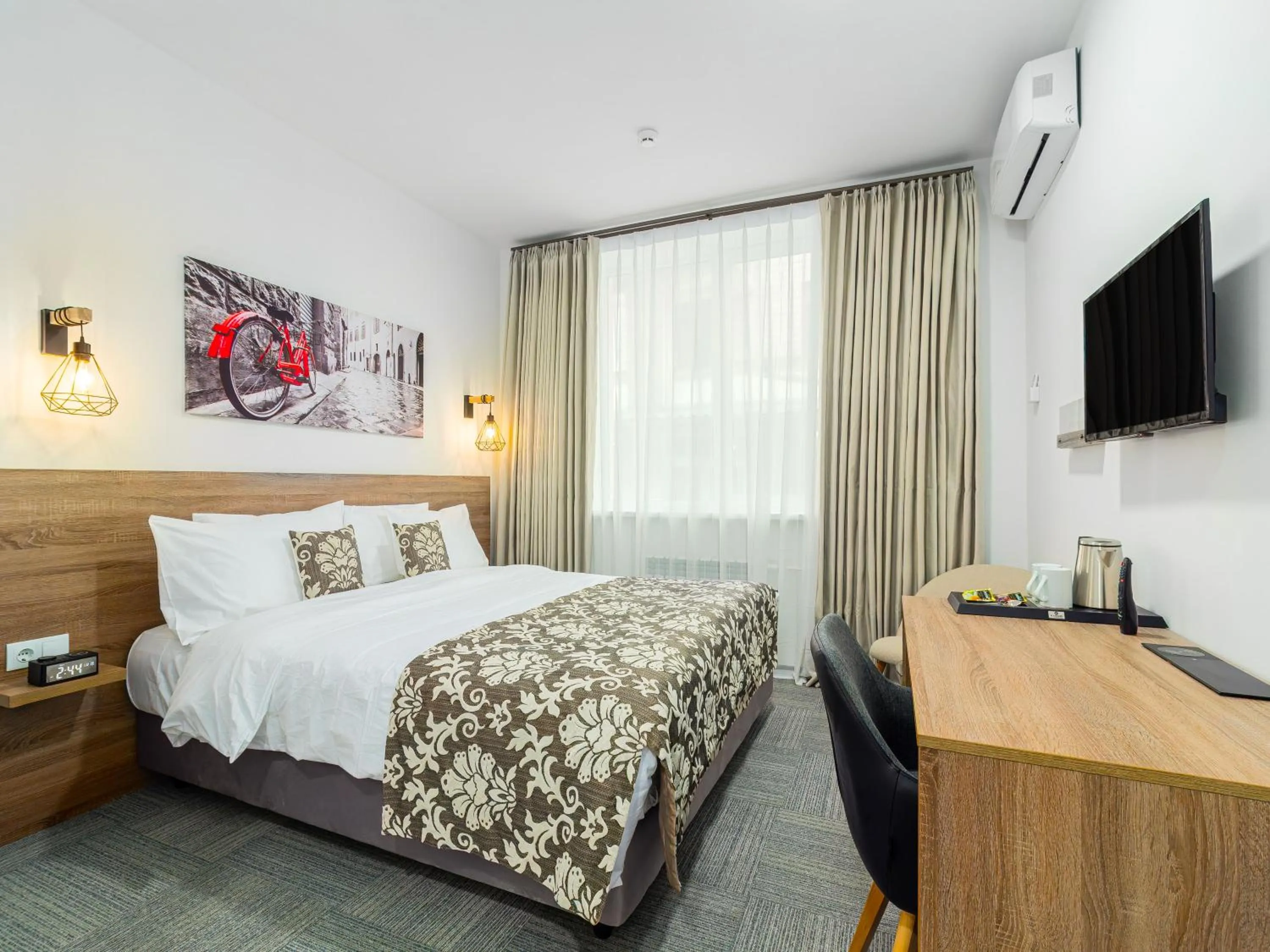 Bed in TA Collection Hotel