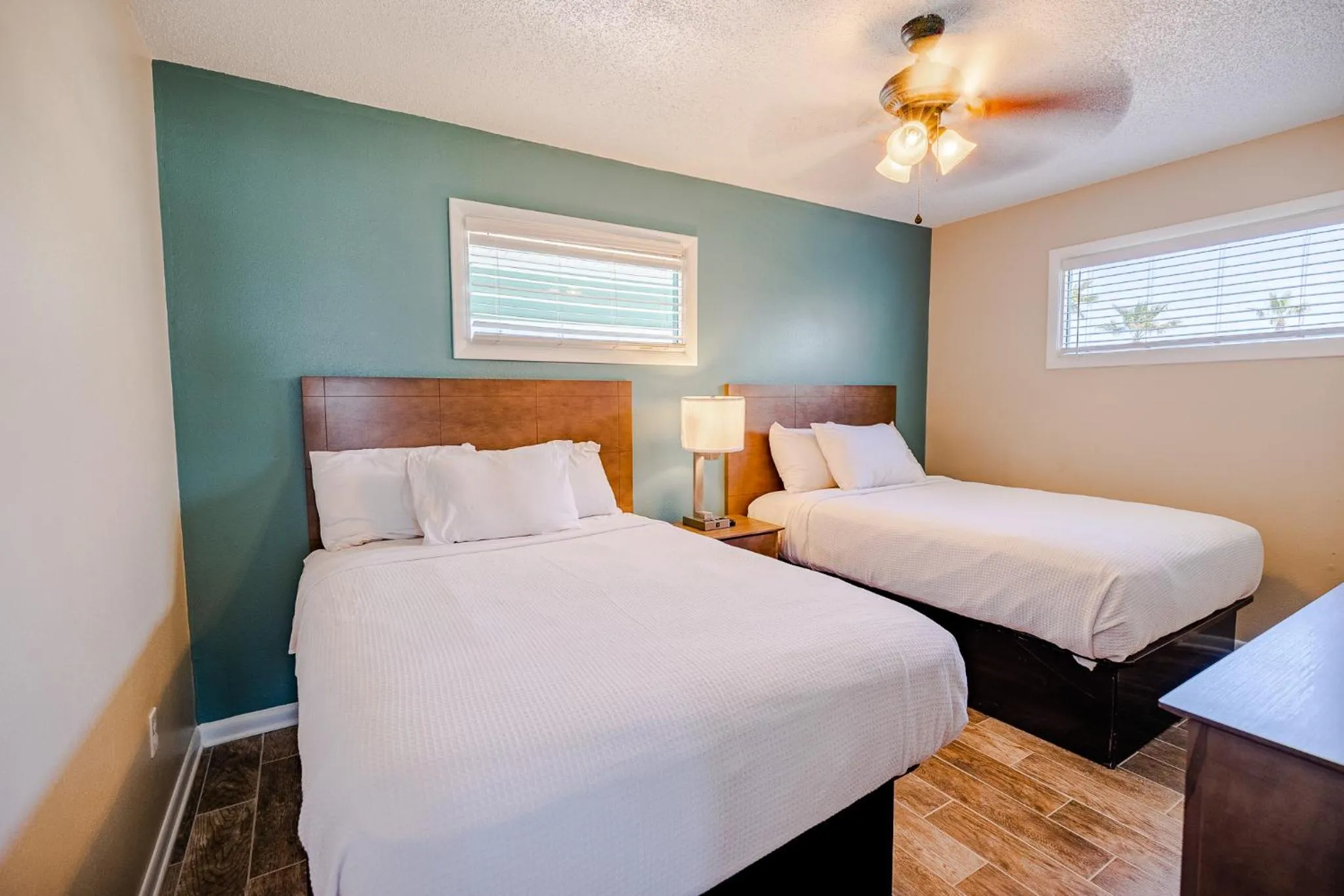 Bed in Sandpiper Beacon Beach Resort