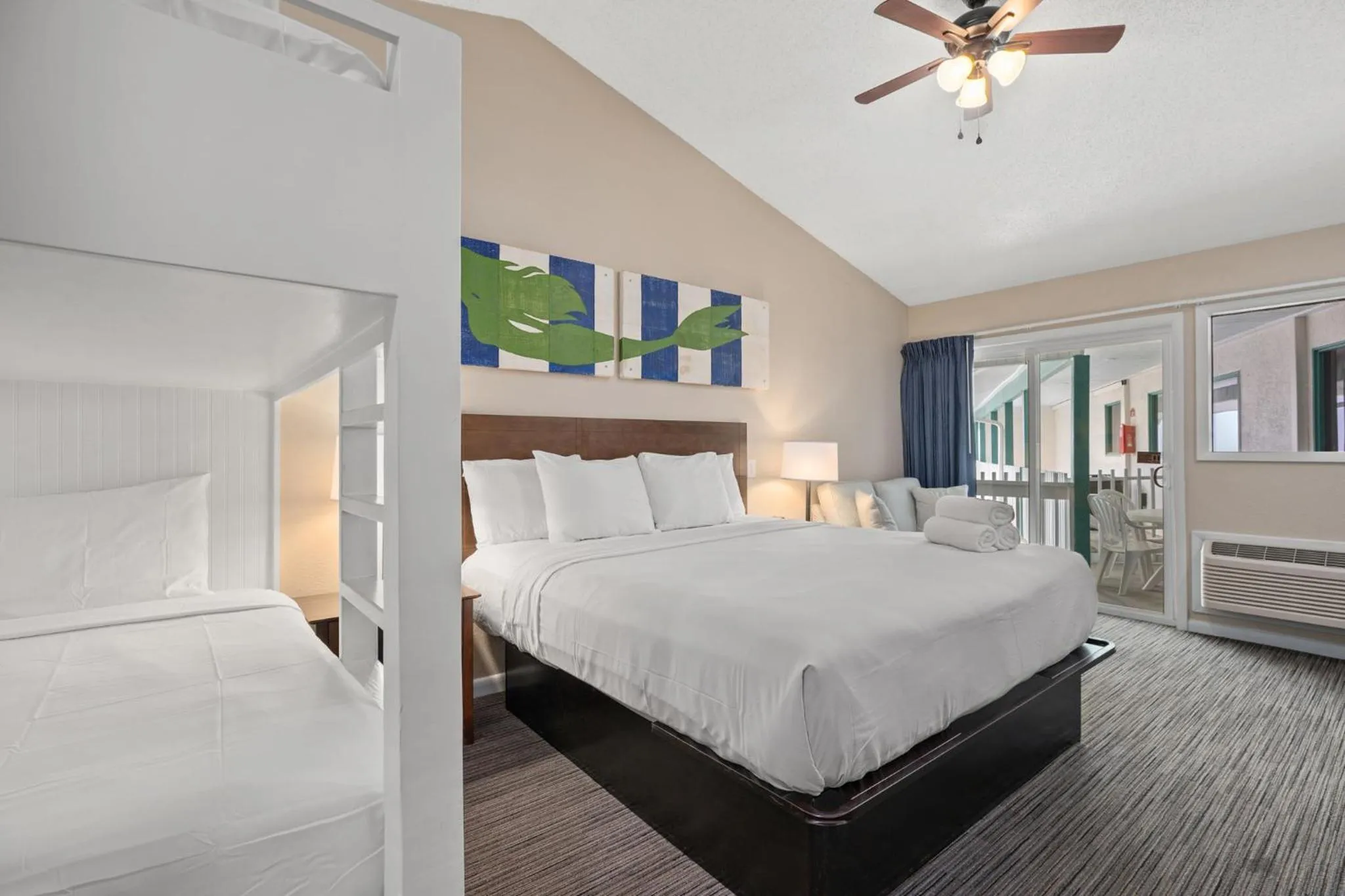 Bed in Sandpiper Beacon Beach Resort