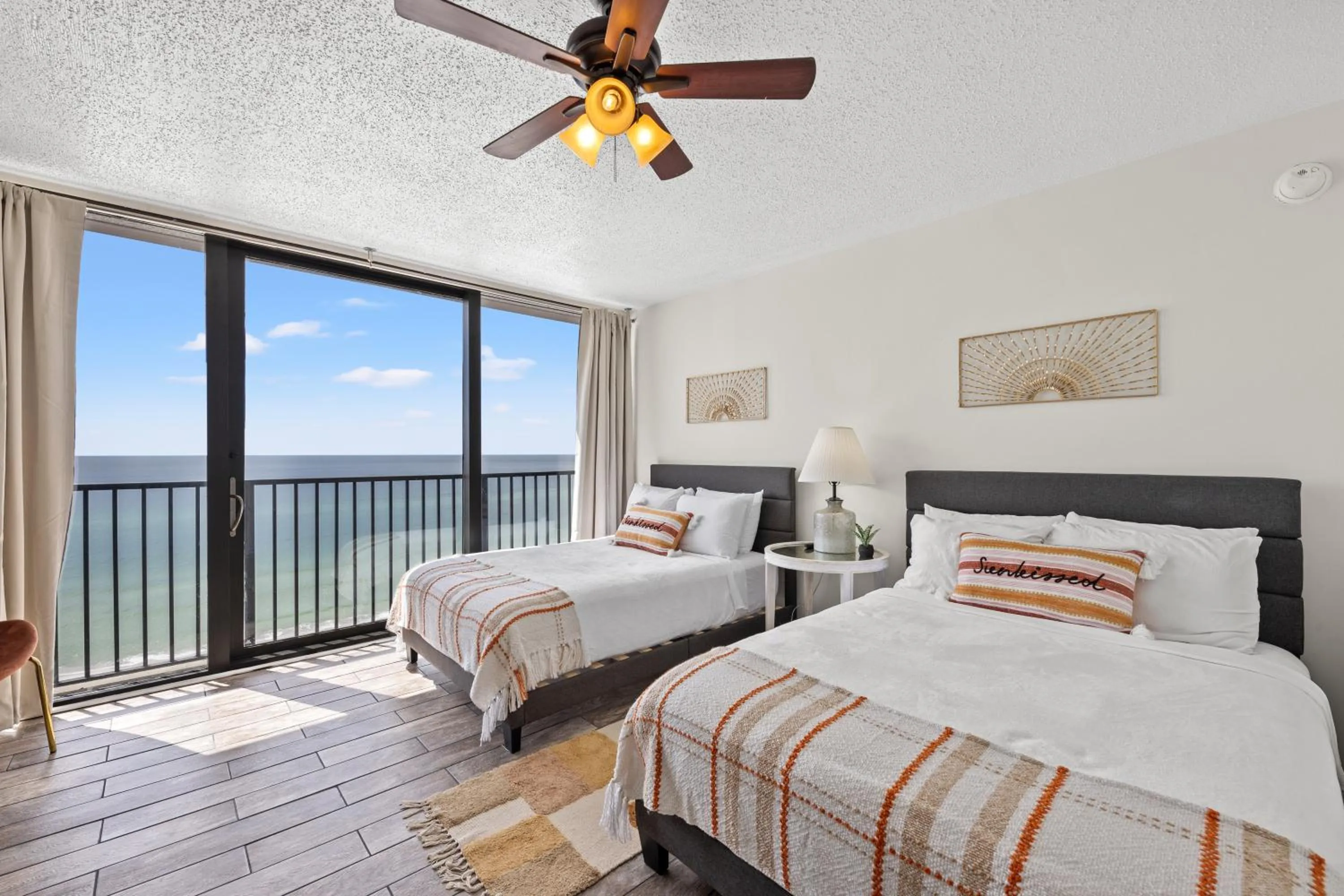 Bed in Sandpiper Beacon Beach Resort